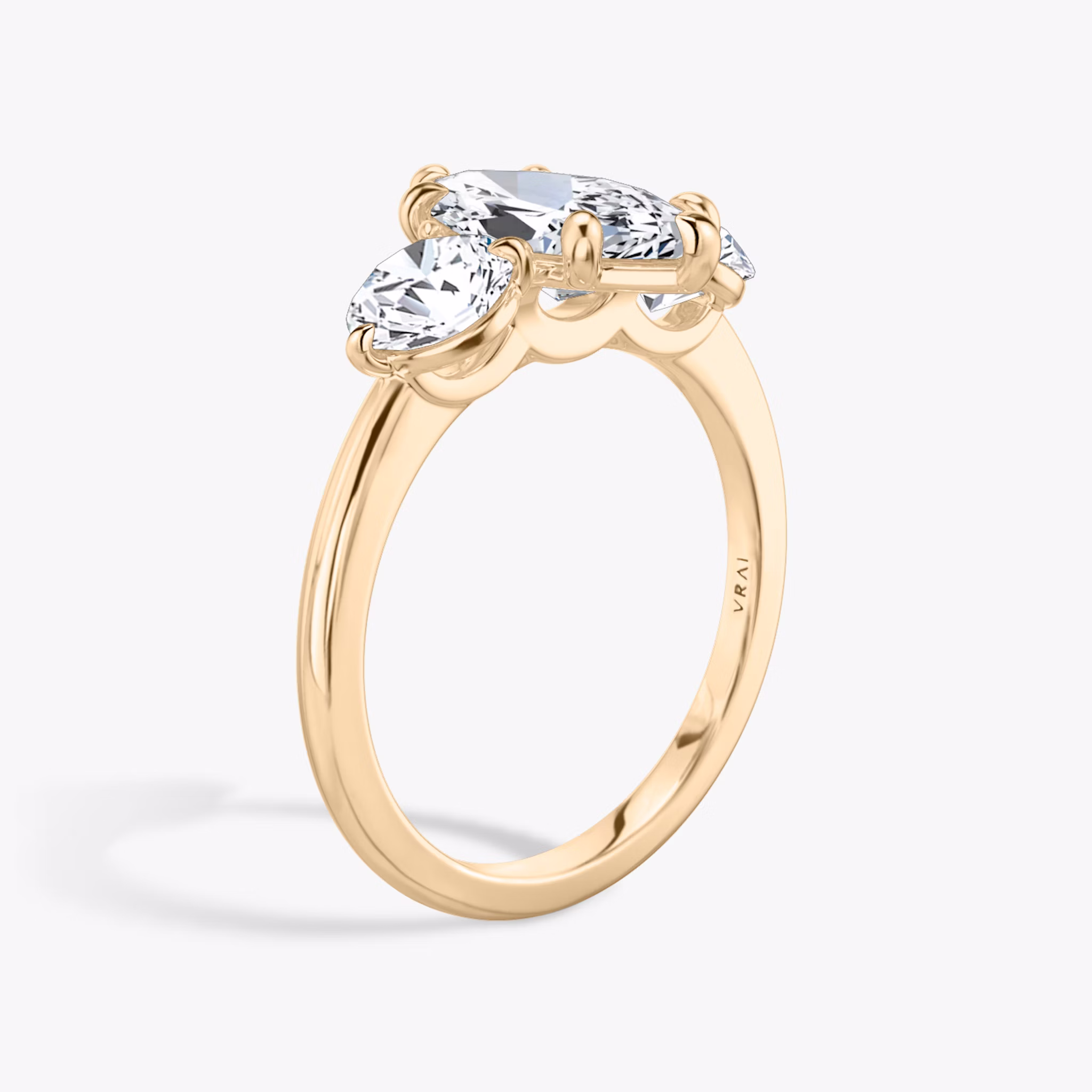 The Three Stone | Marquise | 14k | Rose Gold | bandAccent: Plain | sideStoneCarat: 0.50ct | sideStoneShape: Round Brilliant | diamondOrientation: vertical | caratWeight: other