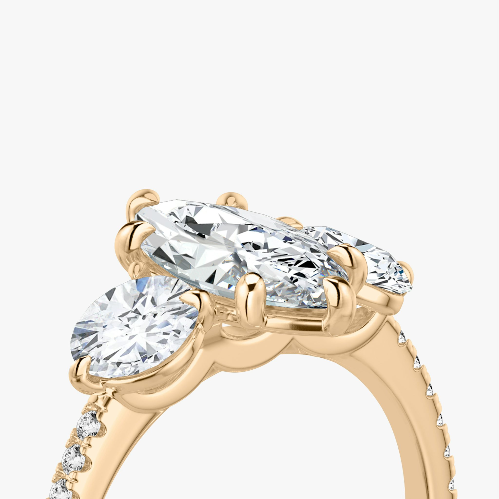 The Three Stone | Marquise | 14k | Rose Gold | bandAccent: Pavé | sideStoneCarat: 0.50ct | sideStoneShape: Round Brilliant | diamondOrientation: vertical | caratWeight: other