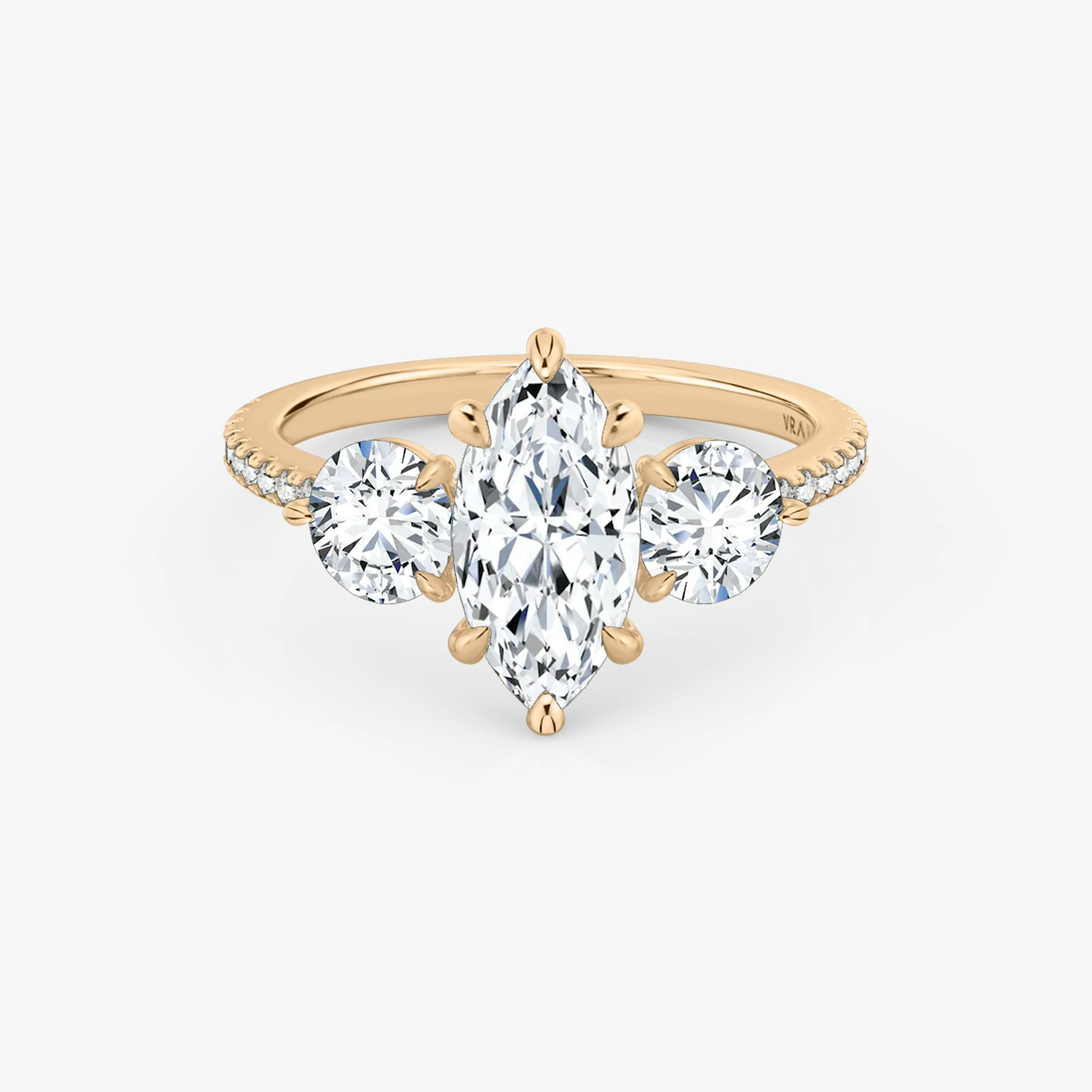 The Three Stone | Marquise | 14k | Rose Gold | bandAccent: Pavé | sideStoneCarat: 0.50ct | sideStoneShape: Round Brilliant | diamondOrientation: vertical | caratWeight: other