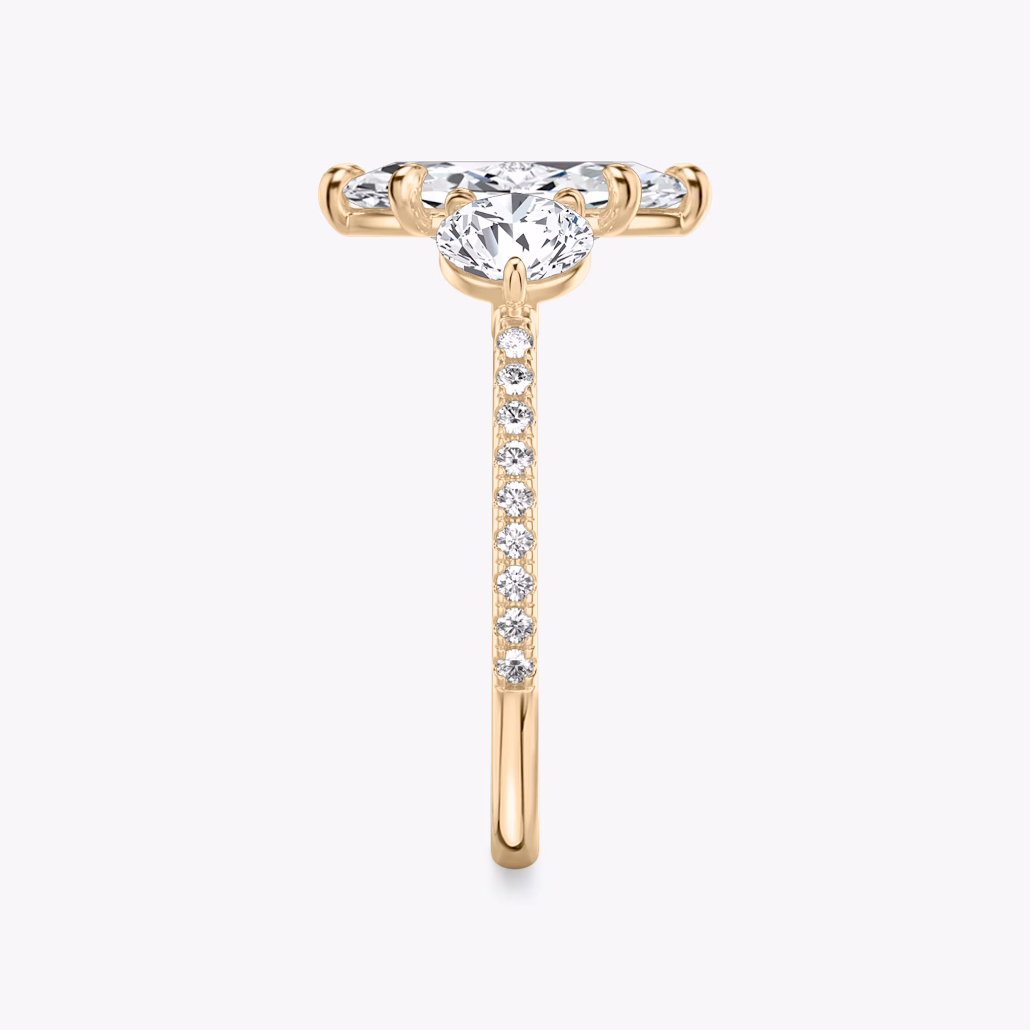 The Three Stone | Marquise | 14k | Rose Gold | bandAccent: Pavé | sideStoneCarat: 0.50ct | sideStoneShape: Round Brilliant | diamondOrientation: vertical | caratWeight: other