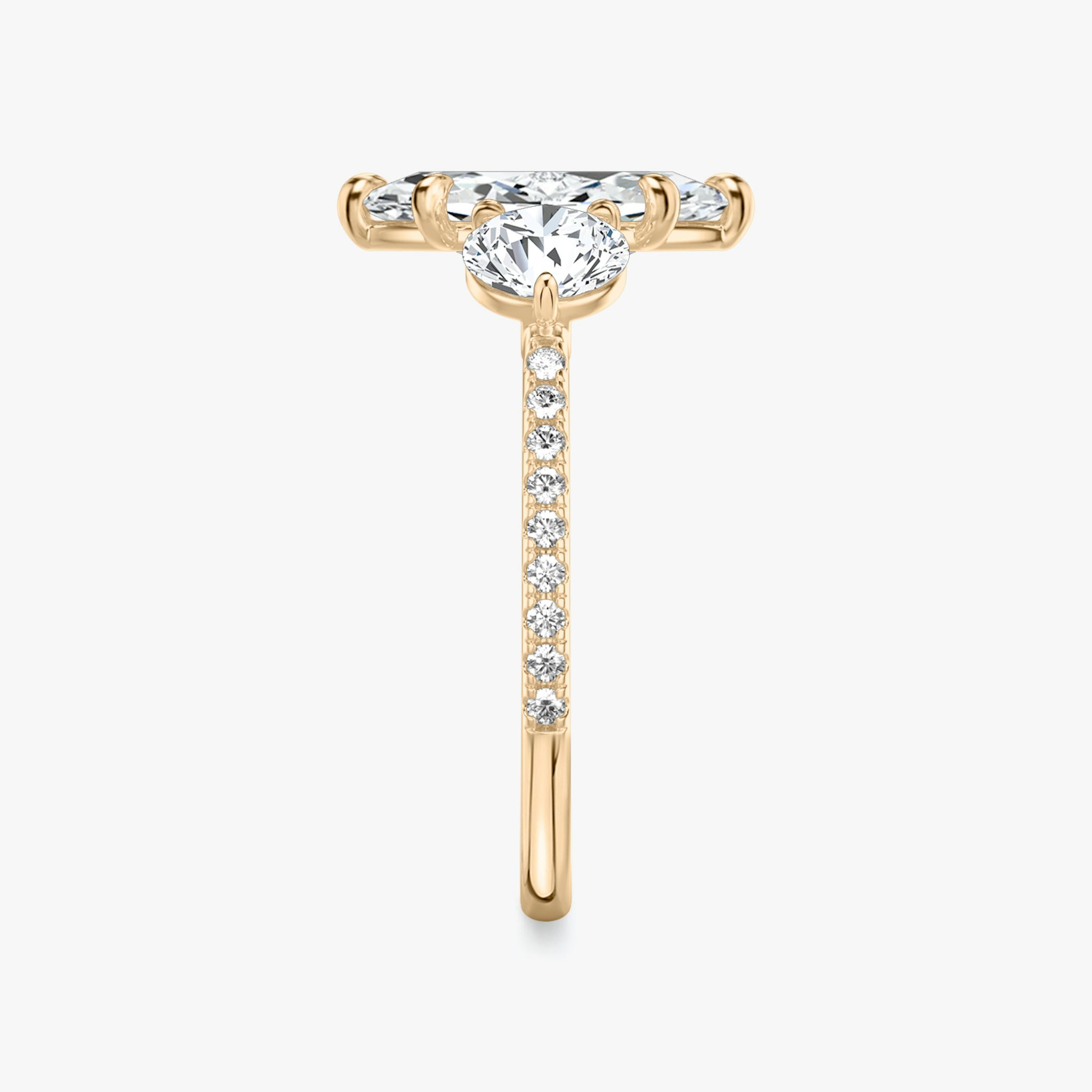 The Three Stone | Marquise | 14k | Rose Gold | bandAccent: Pavé | sideStoneCarat: 0.50ct | sideStoneShape: Round Brilliant | diamondOrientation: vertical | caratWeight: other