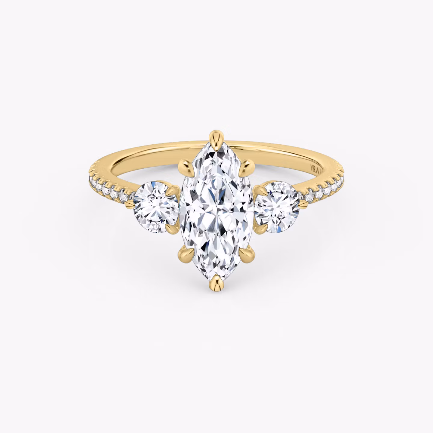 The Three Stone | Marquise | 18k | Yellow Gold | bandAccent: Pavé | sideStoneCarat: 0.25ct | sideStoneShape: Round Brilliant | diamondOrientation: vertical | caratWeight: other