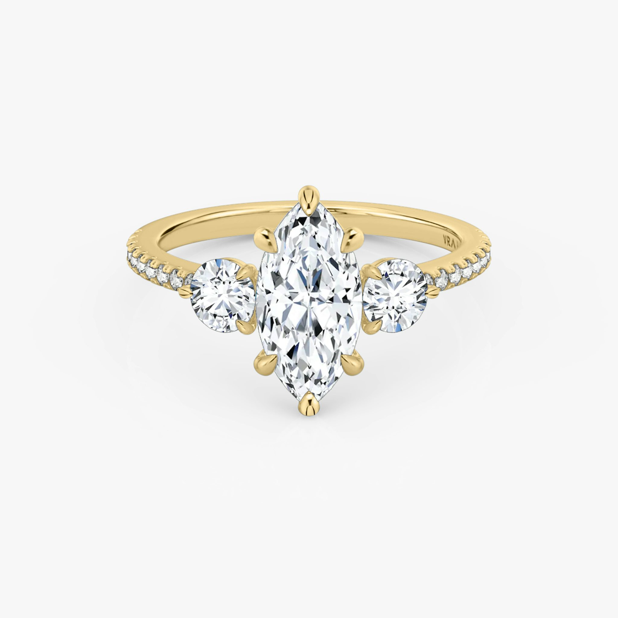 The Three Stone | Marquise | 18k | Yellow Gold | bandAccent: Pavé | sideStoneCarat: 0.25ct | sideStoneShape: Round Brilliant | diamondOrientation: vertical | caratWeight: other