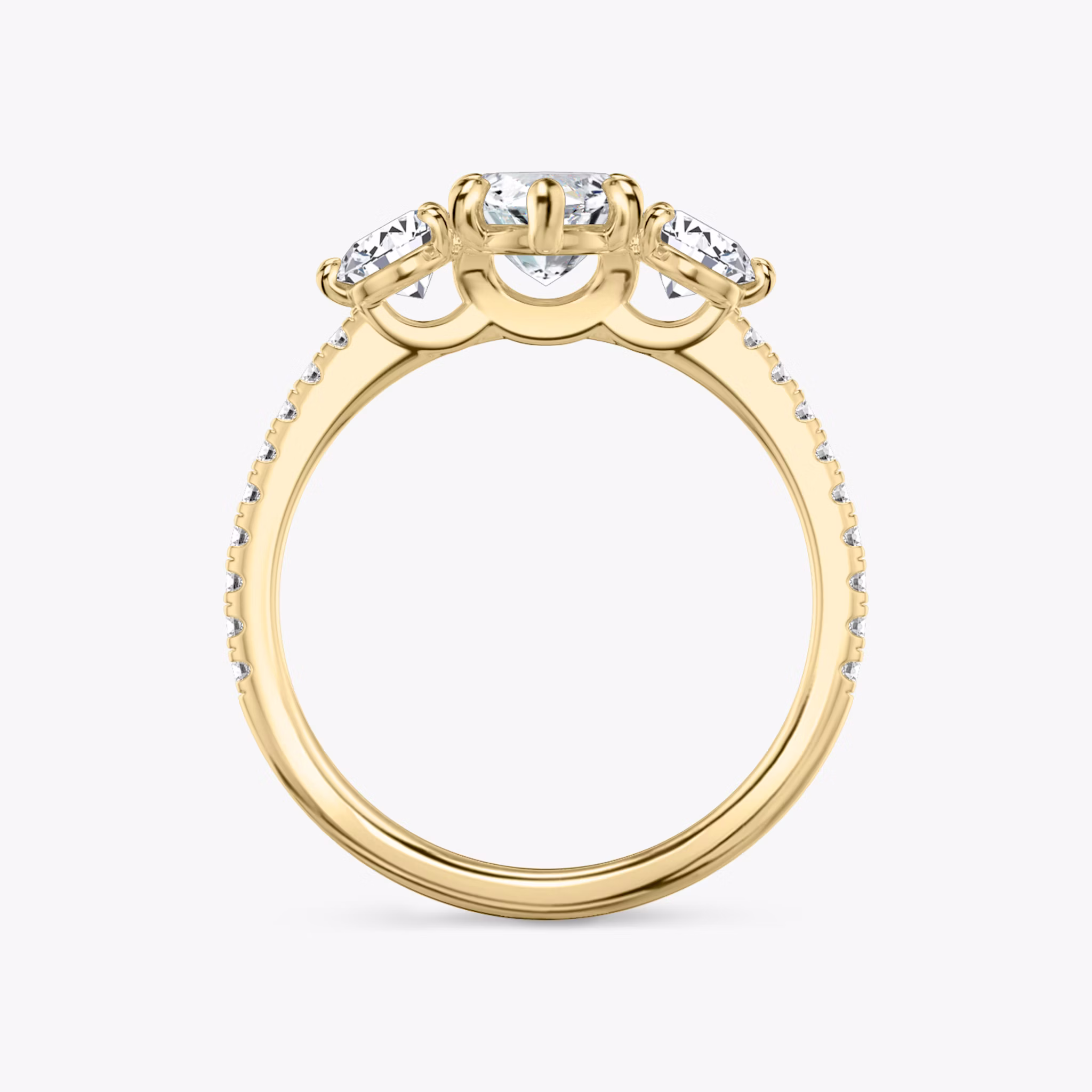 The Three Stone | Marquise | 18k | Yellow Gold | bandAccent: Pavé | sideStoneCarat: 0.25ct | sideStoneShape: Round Brilliant | diamondOrientation: vertical | caratWeight: other