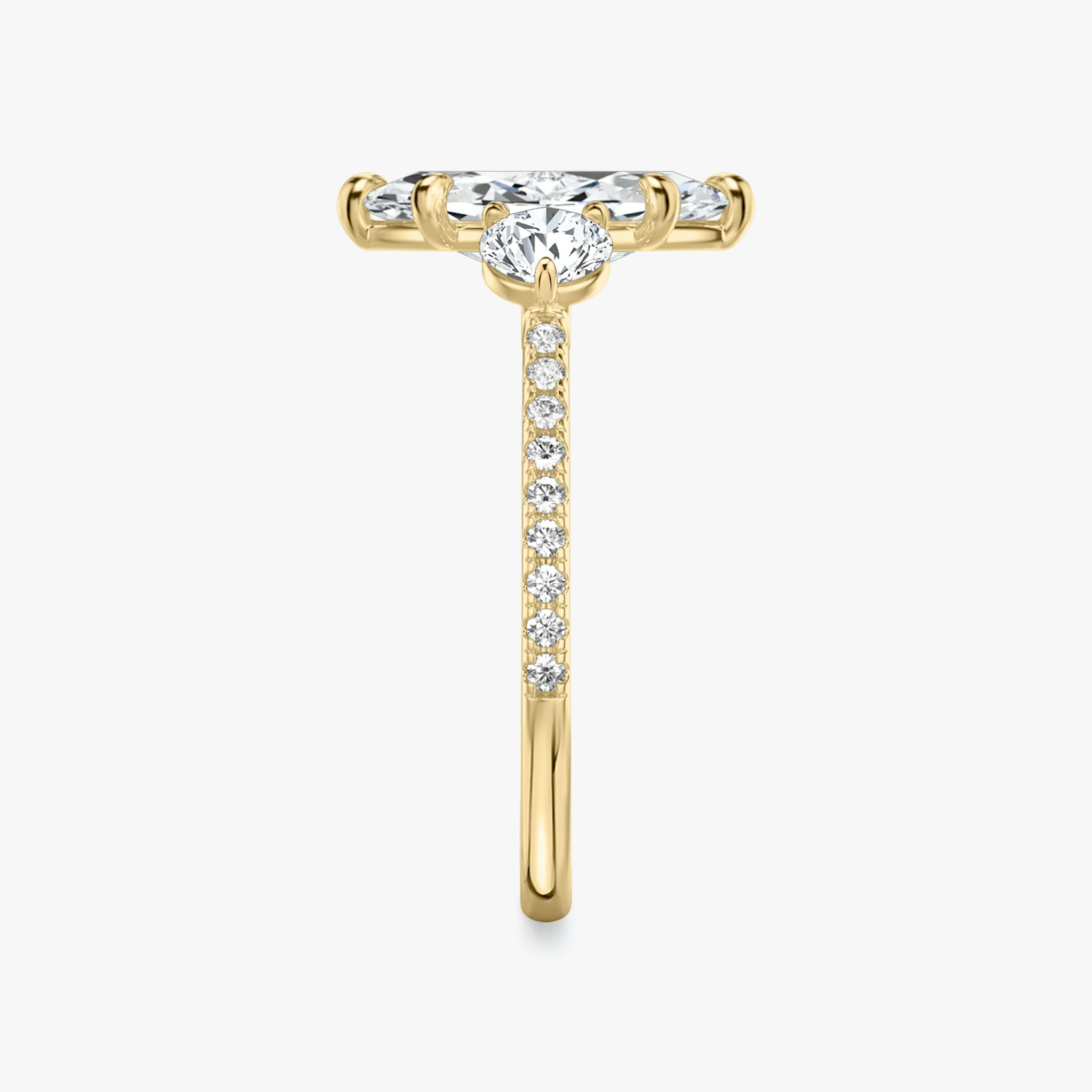 The Three Stone | Marquise | 18k | Yellow Gold | bandAccent: Pavé | sideStoneCarat: 0.25ct | sideStoneShape: Round Brilliant | diamondOrientation: vertical | caratWeight: other