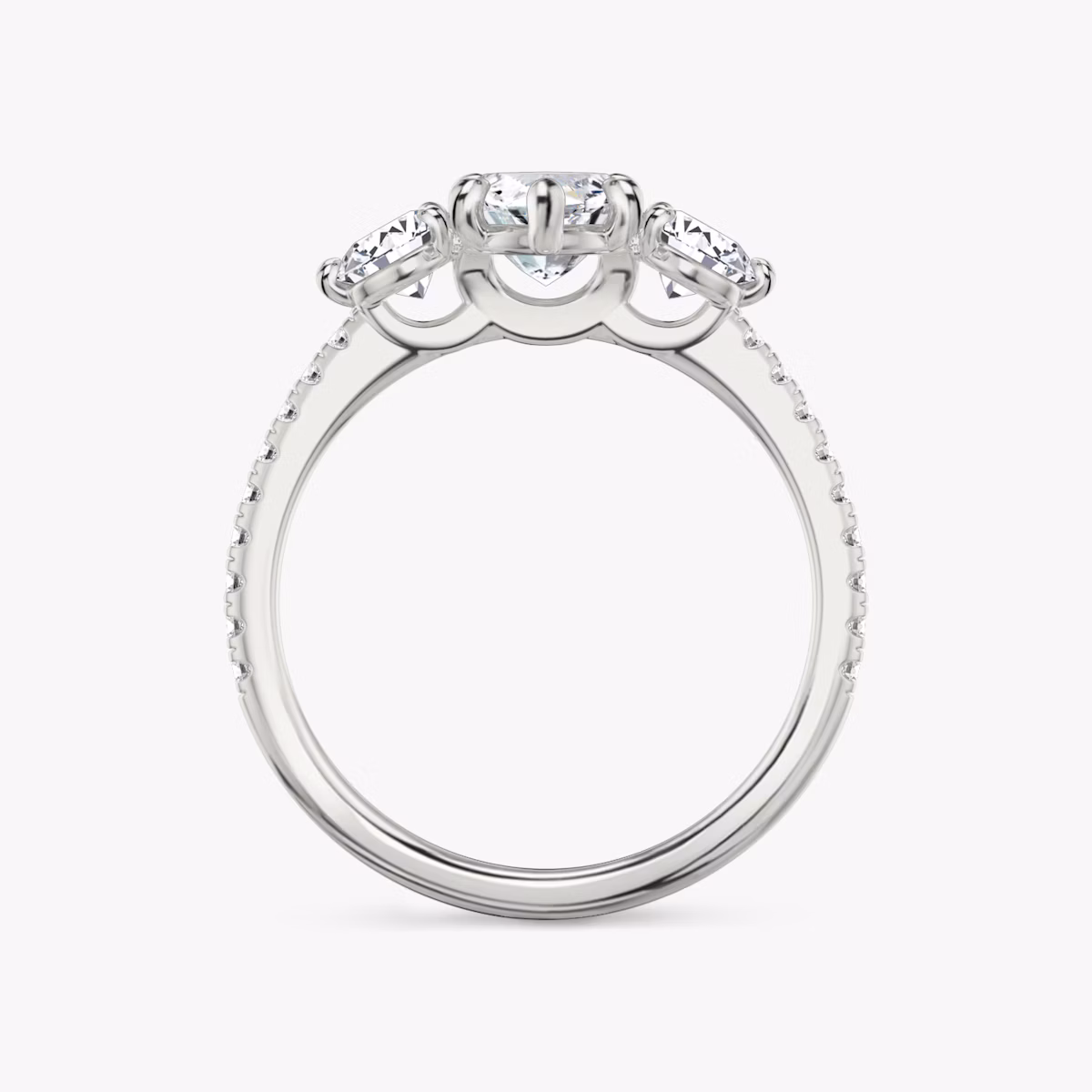 The Three Stone | Marquise | Platinum | bandAccent: Pavé | sideStoneCarat: 0.25ct | sideStoneShape: Round Brilliant | diamondOrientation: vertical | caratWeight: other