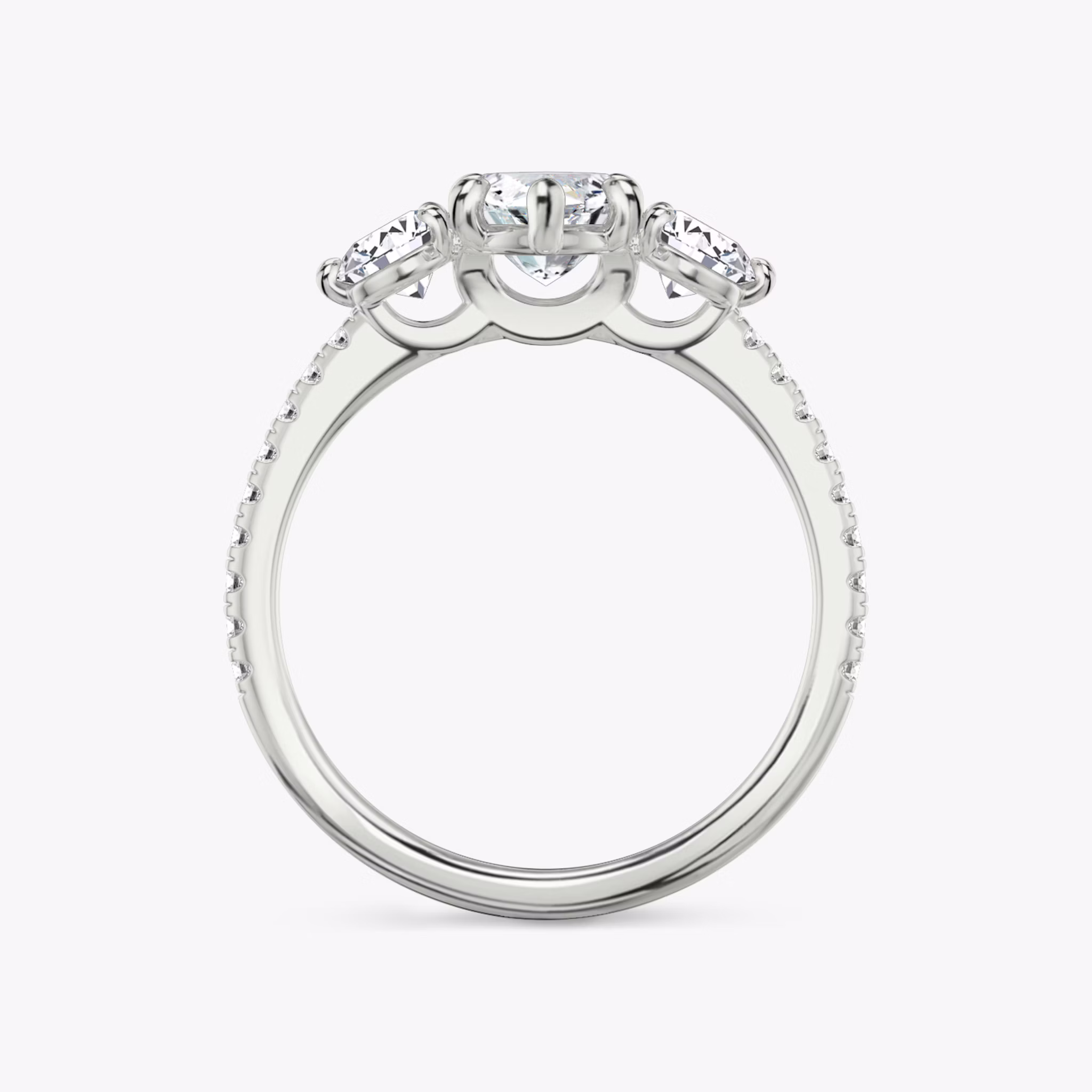 The Three Stone | Marquise | 18k | White Gold | bandAccent: Pavé | sideStoneCarat: 0.25ct | sideStoneShape: Round Brilliant | diamondOrientation: vertical | caratWeight: other
