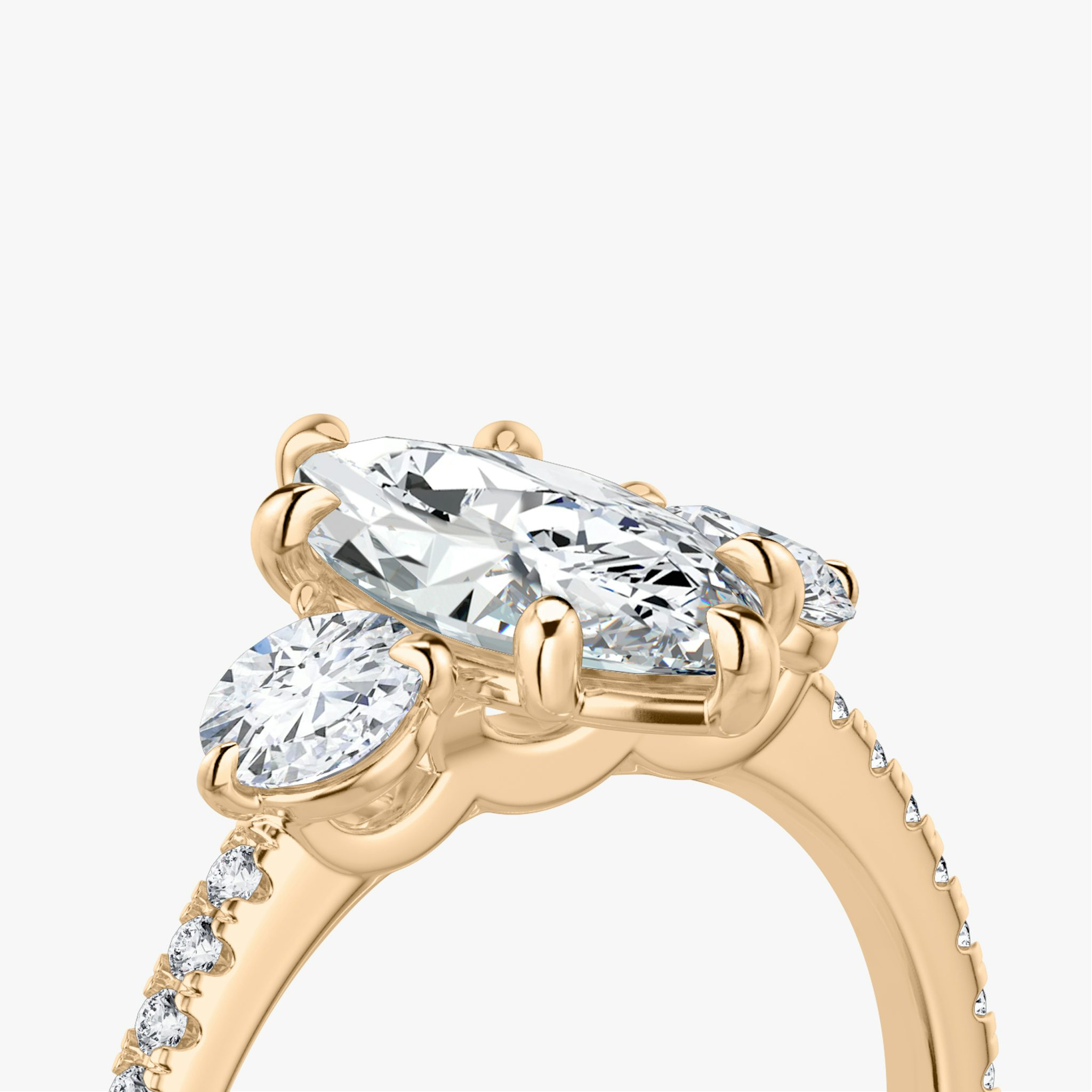 The Three Stone | Marquise | 14k | Rose Gold | bandAccent: Pavé | sideStoneCarat: 0.25ct | sideStoneShape: Round Brilliant | diamondOrientation: vertical | caratWeight: other