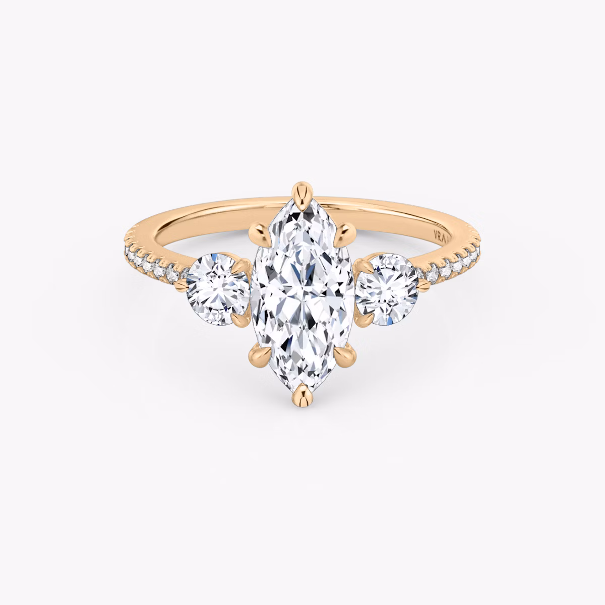 The Three Stone | Marquise | 14k | Rose Gold | bandAccent: Pavé | sideStoneCarat: 0.25ct | sideStoneShape: Round Brilliant | diamondOrientation: vertical | caratWeight: other
