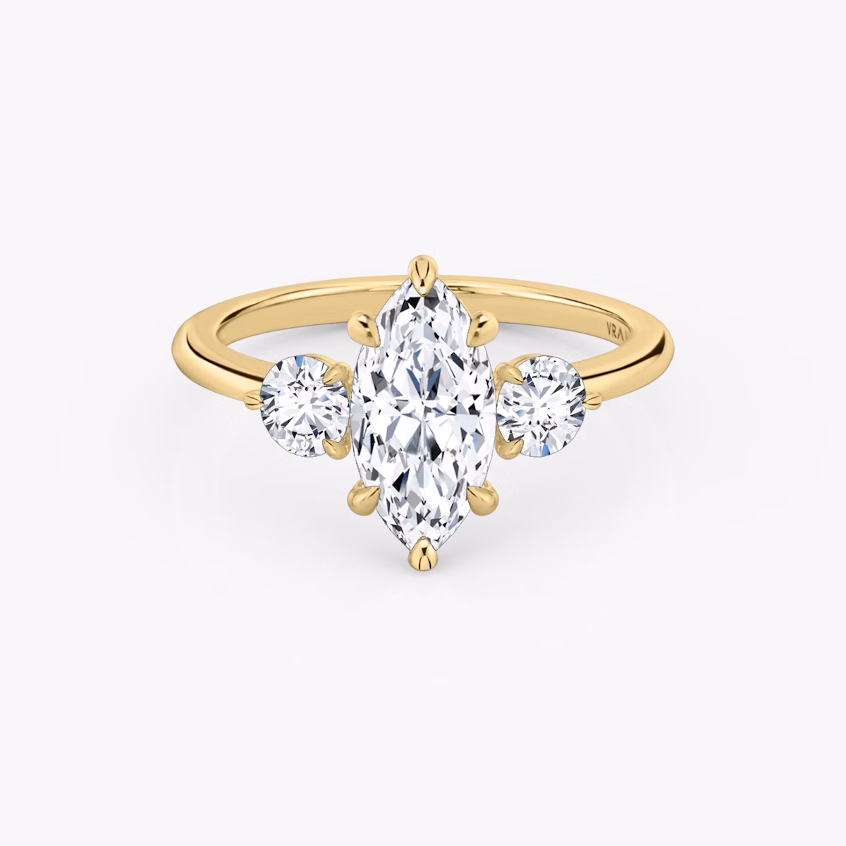 The Three Stone | Marquise | 18k | Yellow Gold | bandAccent: Plain | sideStoneCarat: 0.25ct | sideStoneShape: Round Brilliant | diamondOrientation: vertical | caratWeight: other