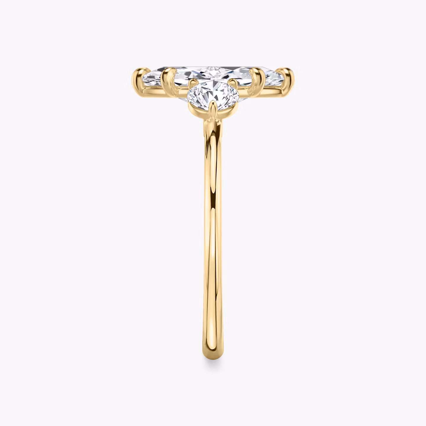 The Three Stone | Marquise | 18k | Yellow Gold | bandAccent: Plain | sideStoneCarat: 0.25ct | sideStoneShape: Round Brilliant | diamondOrientation: vertical | caratWeight: other