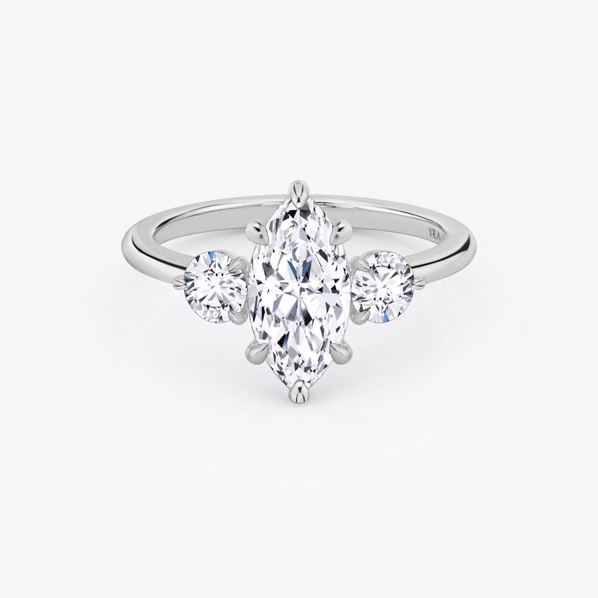 The Three Stone | Marquise | Platinum | bandAccent: Plain | sideStoneCarat: 0.25ct | sideStoneShape: Round Brilliant | diamondOrientation: vertical | caratWeight: other