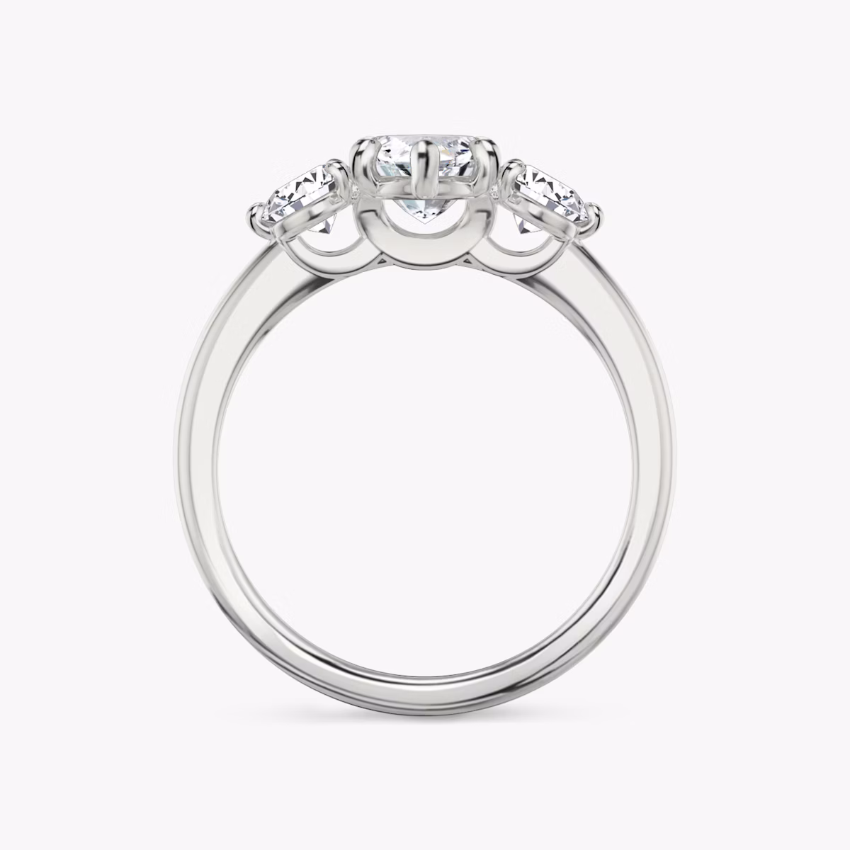 The Three Stone | Marquise | Platinum | bandAccent: Plain | sideStoneCarat: 0.25ct | sideStoneShape: Round Brilliant | diamondOrientation: vertical | caratWeight: other