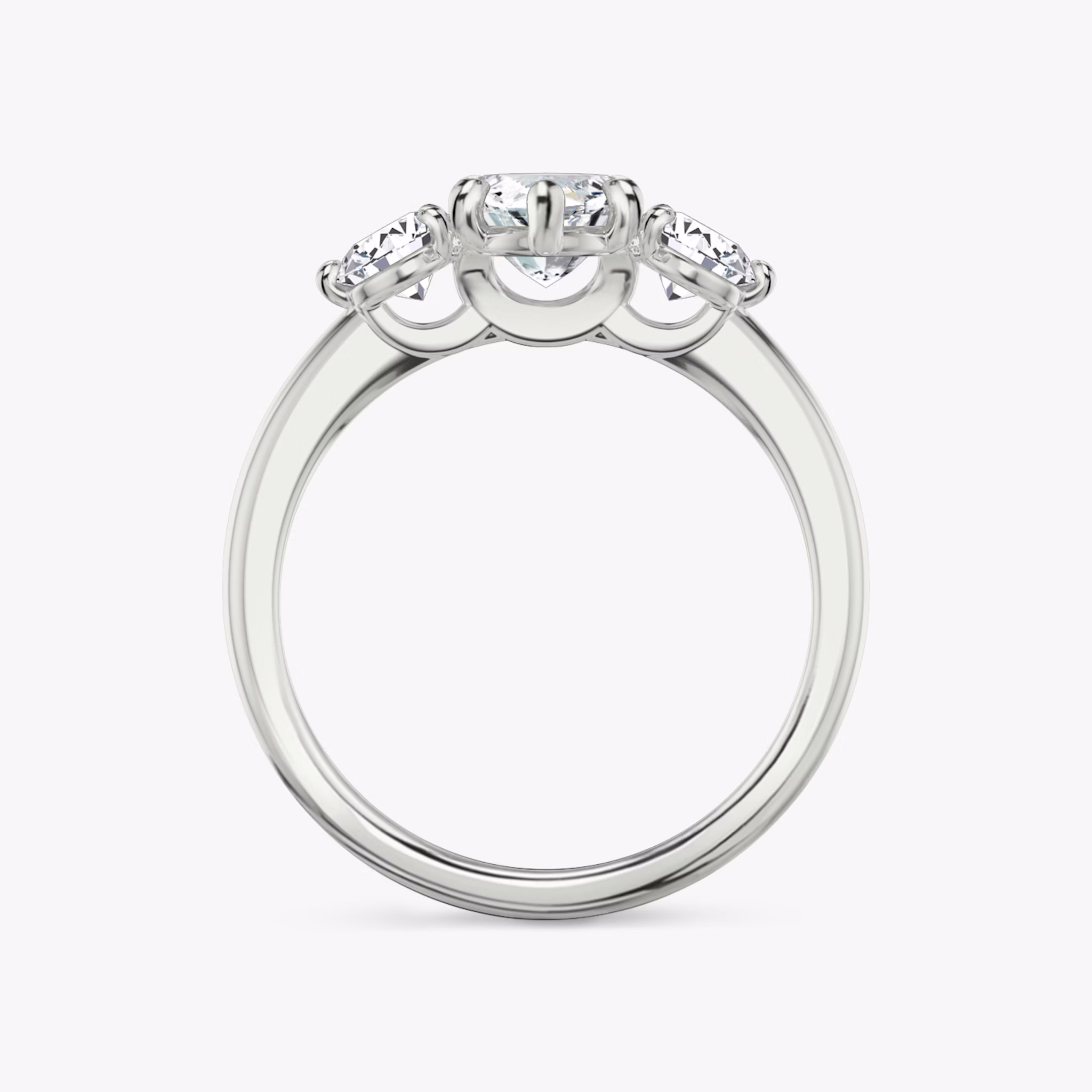 The Three Stone | Marquise | 18k | White Gold | bandAccent: Plain | sideStoneCarat: 0.25ct | sideStoneShape: Round Brilliant | diamondOrientation: vertical | caratWeight: other