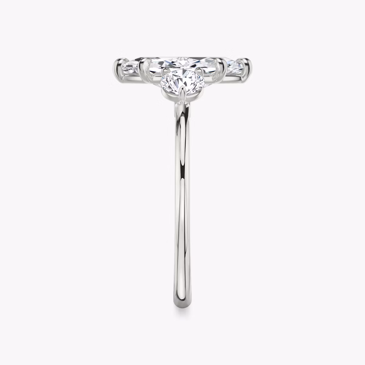 The Three Stone | Marquise | Platinum | bandAccent: Plain | sideStoneCarat: 0.25ct | sideStoneShape: Round Brilliant | diamondOrientation: vertical | caratWeight: other