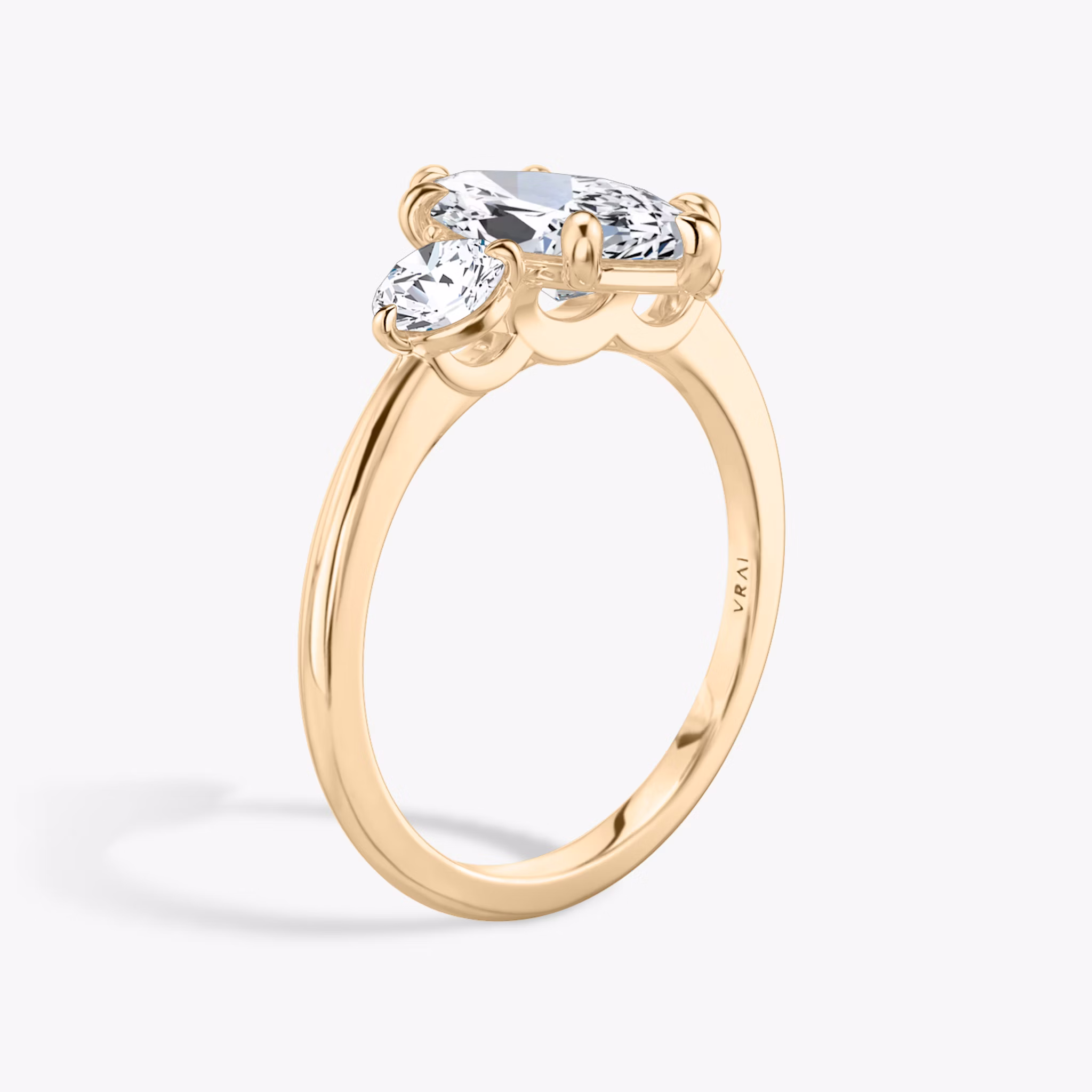 The Three Stone | Marquise | 14k | Rose Gold | bandAccent: Plain | sideStoneCarat: 0.25ct | sideStoneShape: Round Brilliant | diamondOrientation: vertical | caratWeight: other