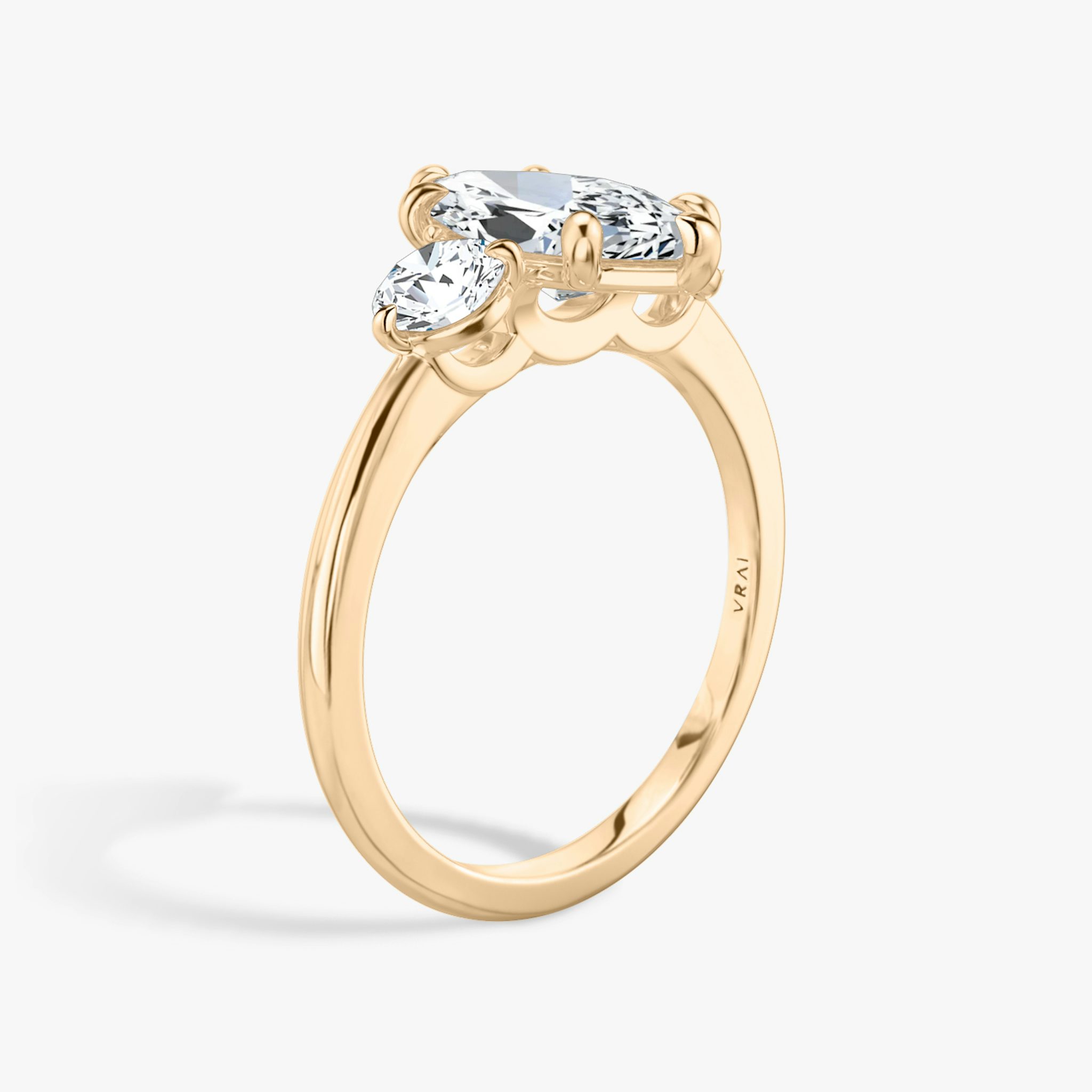 The Three Stone | Marquise | 14k | Rose Gold | bandAccent: Plain | sideStoneCarat: 0.25ct | sideStoneShape: Round Brilliant | diamondOrientation: vertical | caratWeight: other