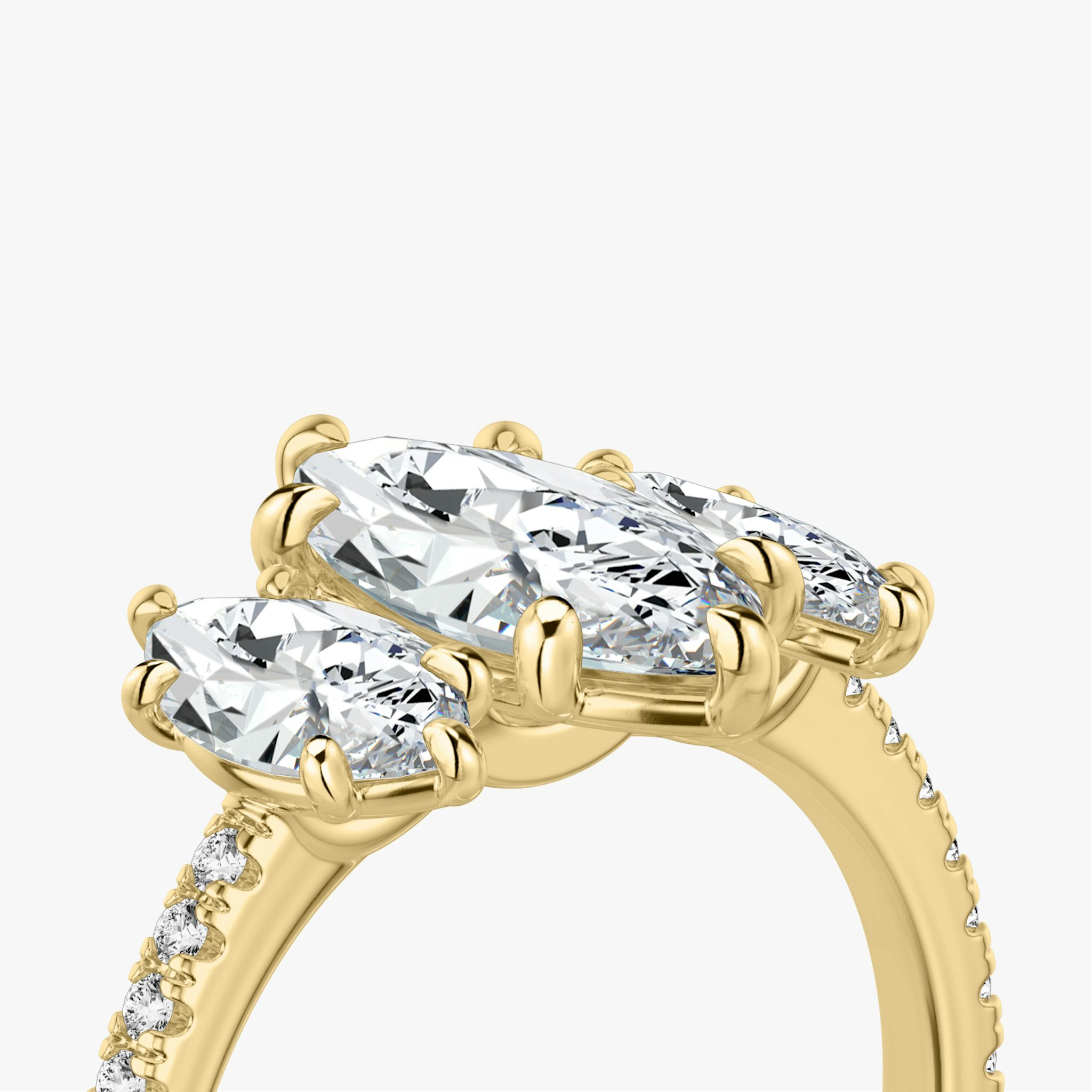 The Three Stone | Marquise | 18k | Yellow Gold | bandAccent: Pavé | sideStoneCarat: 0.50ct | sideStoneShape: Marquise | diamondOrientation: vertical | caratWeight: other
