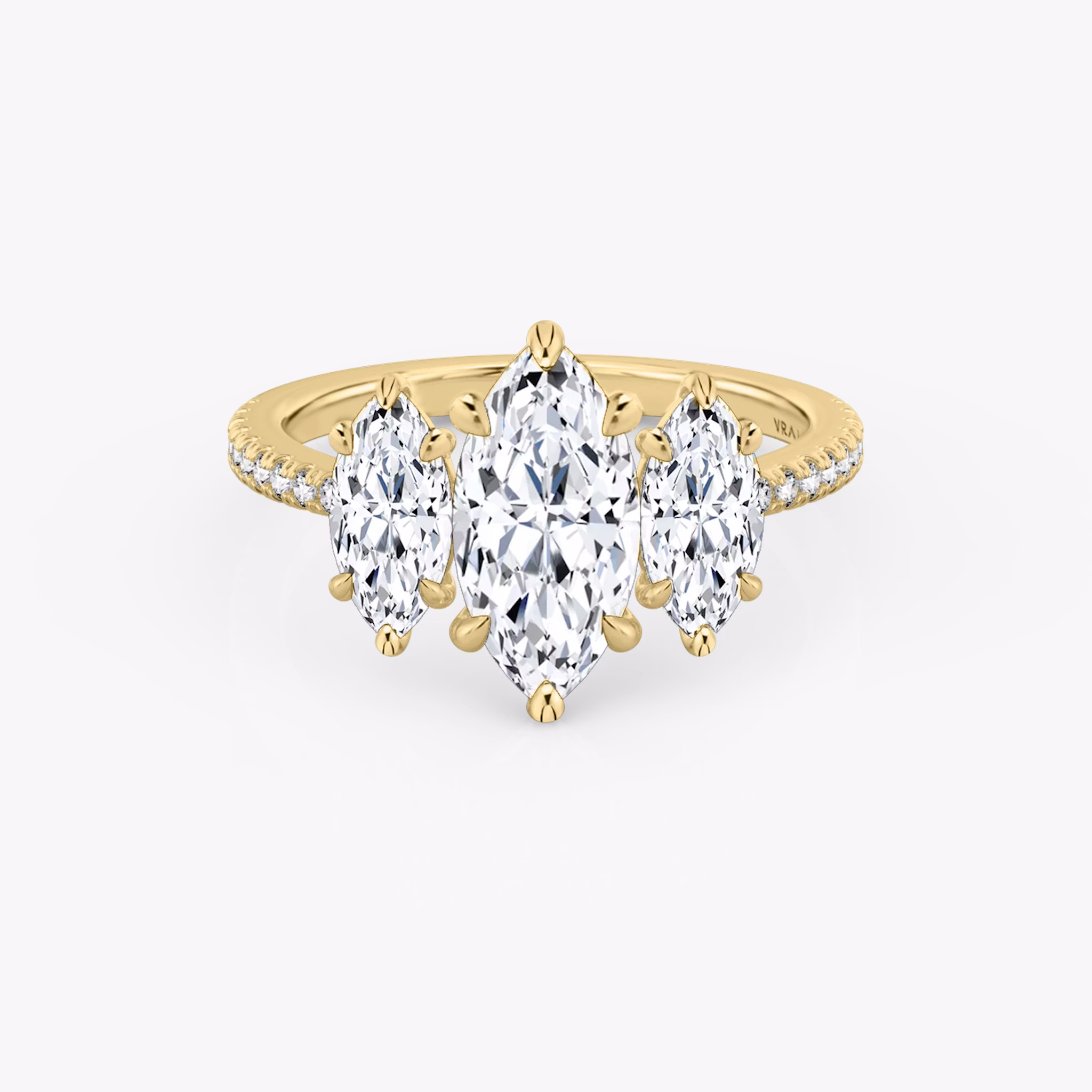 The Three Stone | Marquise | 18k | Yellow Gold | bandAccent: Pavé | sideStoneCarat: 0.50ct | sideStoneShape: Marquise | diamondOrientation: vertical | caratWeight: other