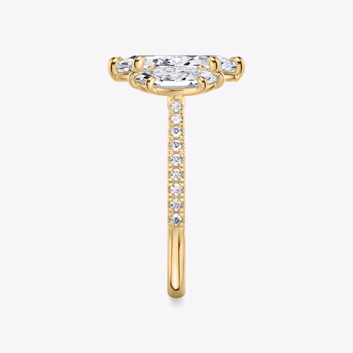 Three Stone | Marquise | 18k | Gelbgold | bandAccent: Mit Pavé-Besatz | sideStoneCarat: 0.50ct | sideStoneShape: Marquise | diamondOrientation: vertical | caratWeight: other