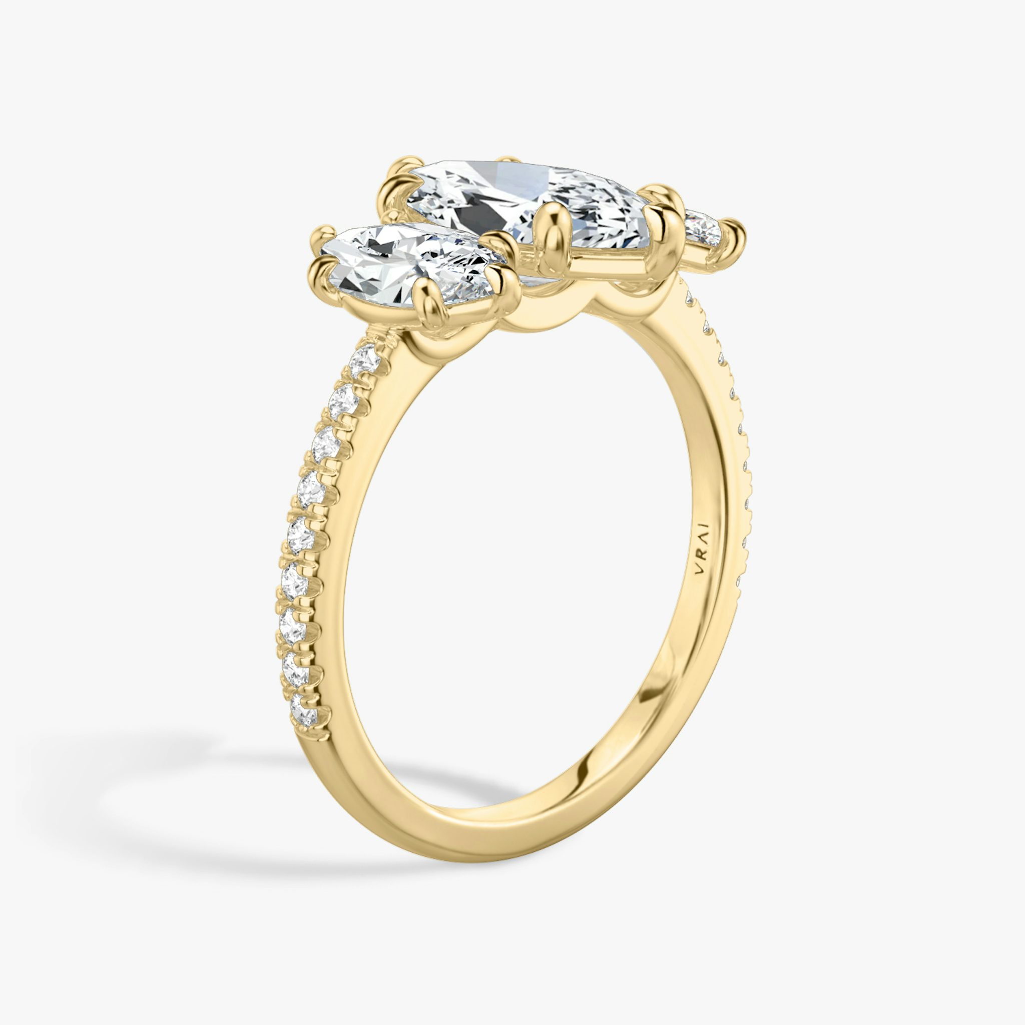 The Three Stone | Marquise | 18k | Yellow Gold | bandAccent: Pavé | sideStoneCarat: 0.50ct | sideStoneShape: Marquise | diamondOrientation: vertical | caratWeight: other