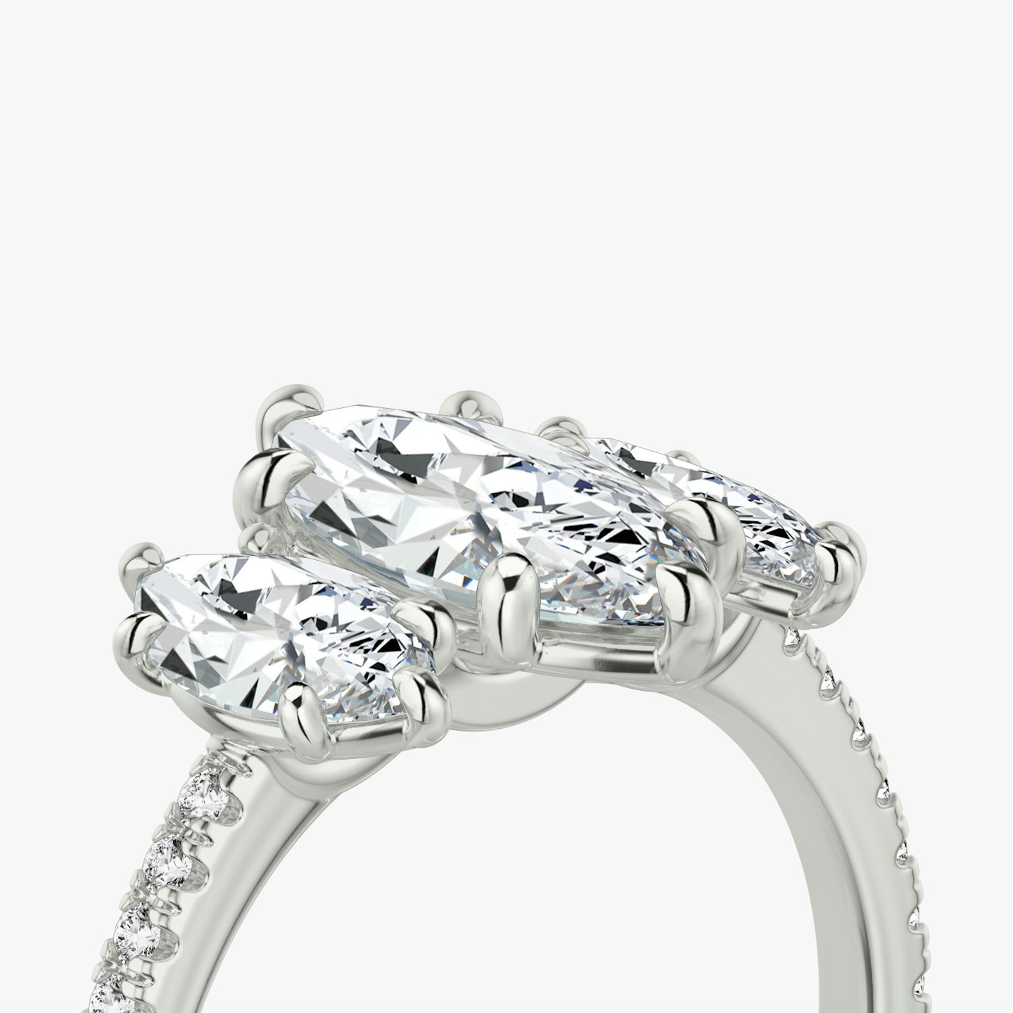 The Three Stone | Marquise | Platinum | bandAccent: Pavé | sideStoneCarat: 0.50ct | sideStoneShape: Marquise | diamondOrientation: vertical | caratWeight: other