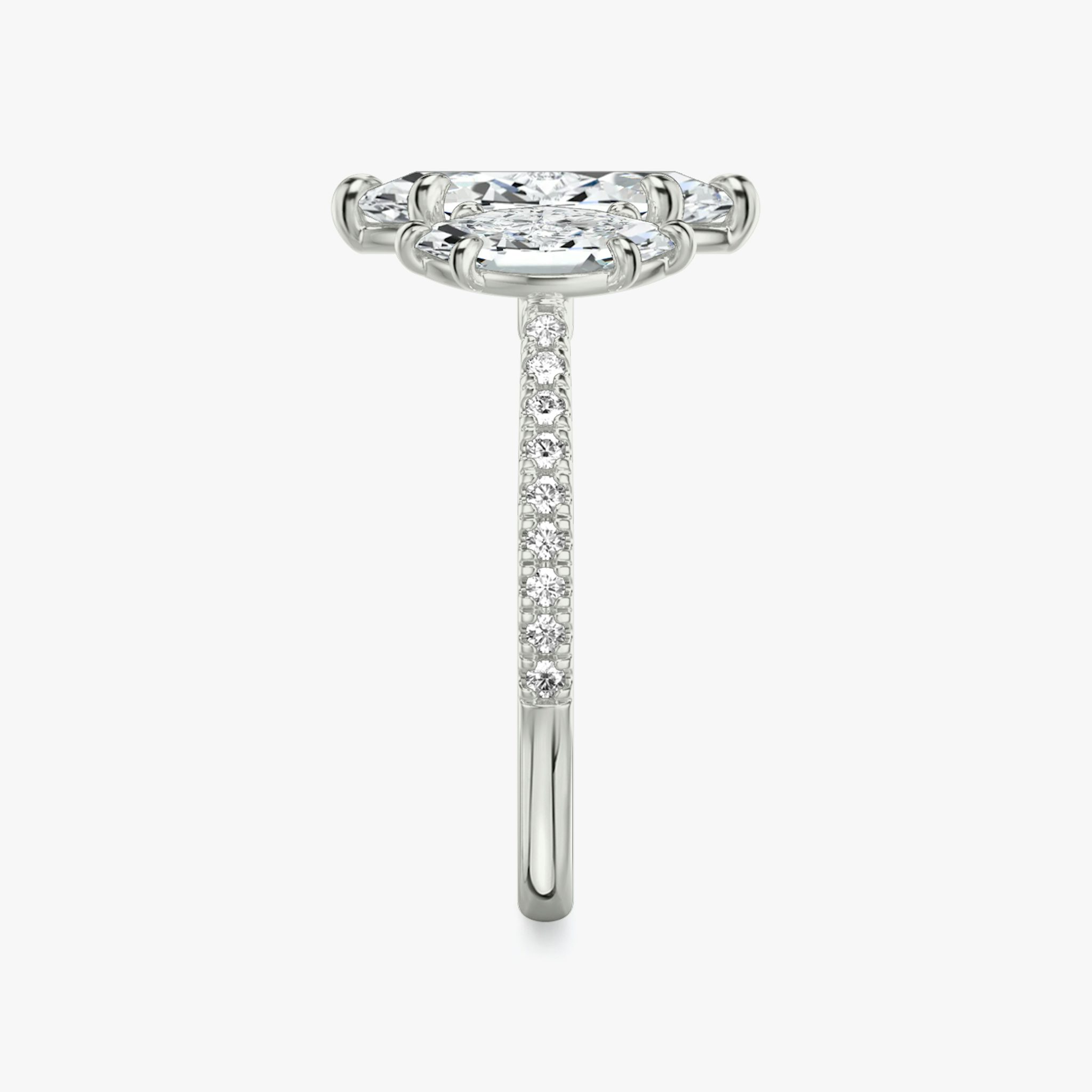 The Three Stone | Marquise | Platinum | bandAccent: Pavé | sideStoneCarat: 0.50ct | sideStoneShape: Marquise | diamondOrientation: vertical | caratWeight: other