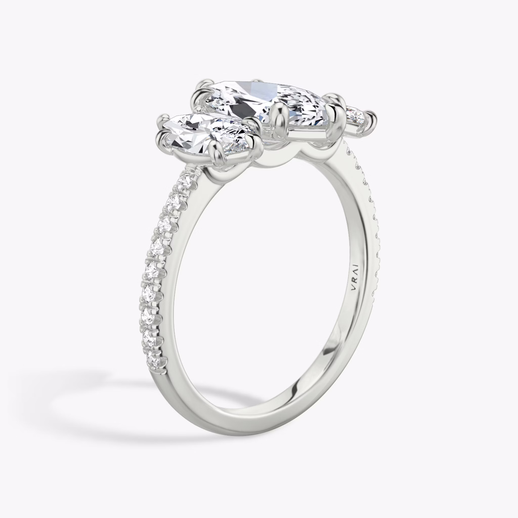 The Three Stone | Marquise | Platinum | bandAccent: Pavé | sideStoneCarat: 0.50ct | sideStoneShape: Marquise | diamondOrientation: vertical | caratWeight: other