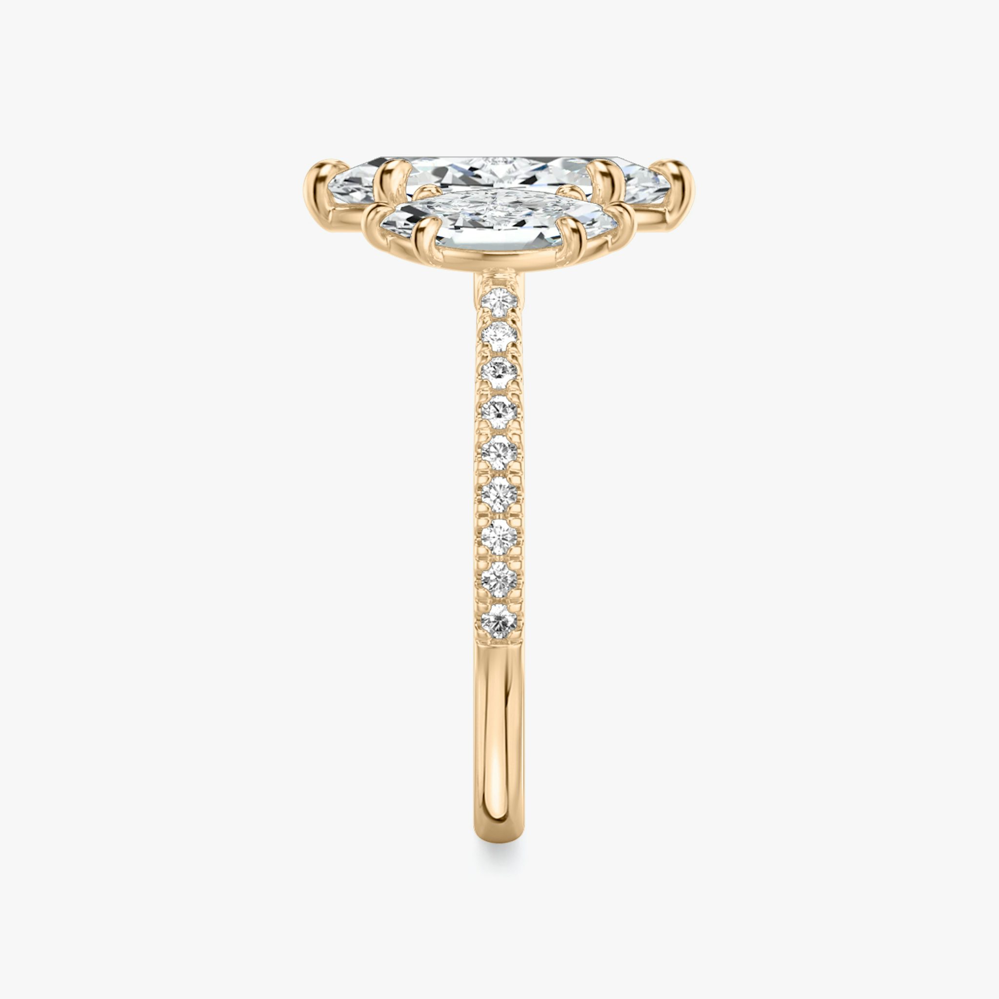 The Three Stone | Marquise | 14k | Rose Gold | bandAccent: Pavé | sideStoneCarat: 0.50ct | sideStoneShape: Marquise | diamondOrientation: vertical | caratWeight: other
