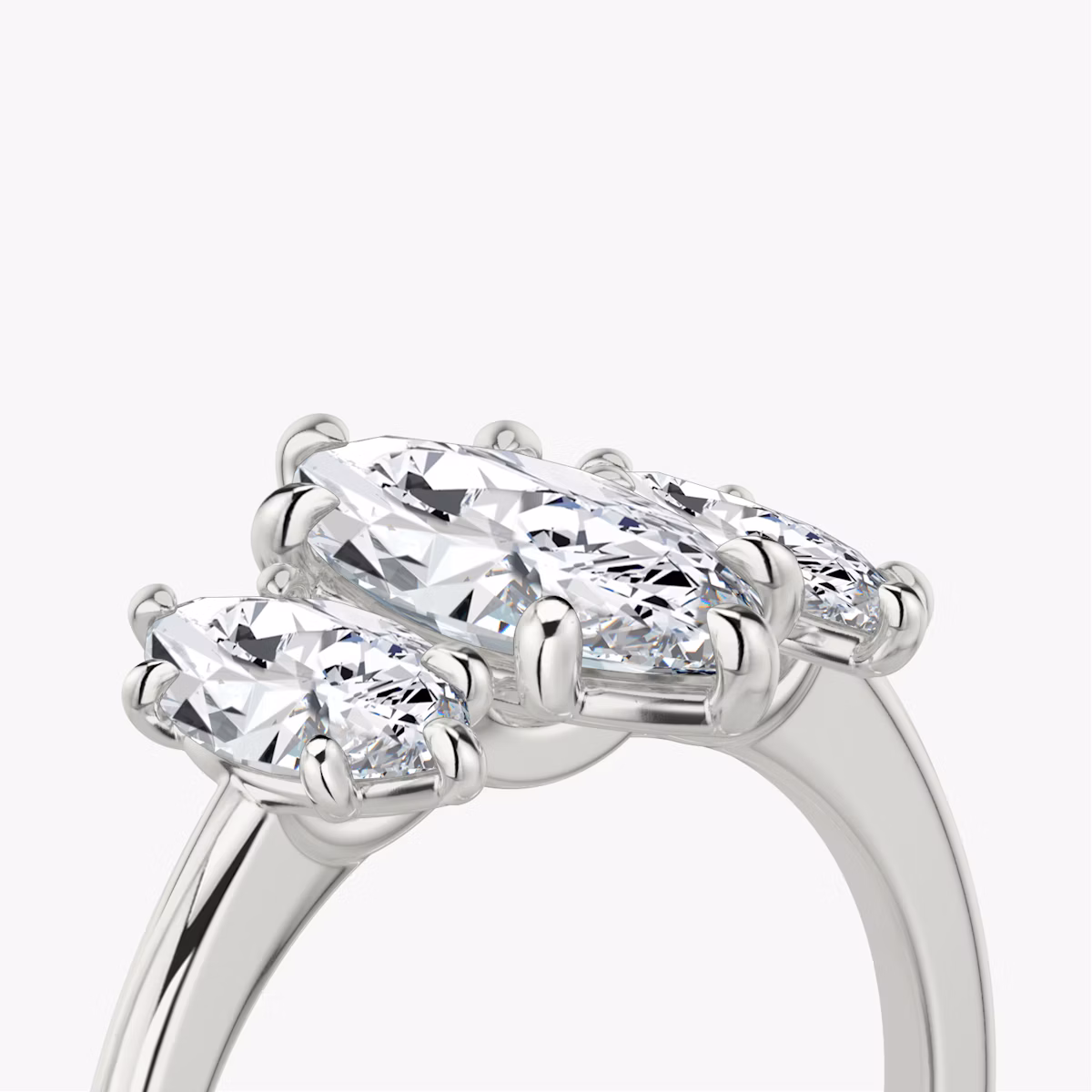 The Three Stone | Marquise | Platinum | bandAccent: Plain | sideStoneCarat: 0.50ct | sideStoneShape: Marquise | diamondOrientation: vertical | caratWeight: other