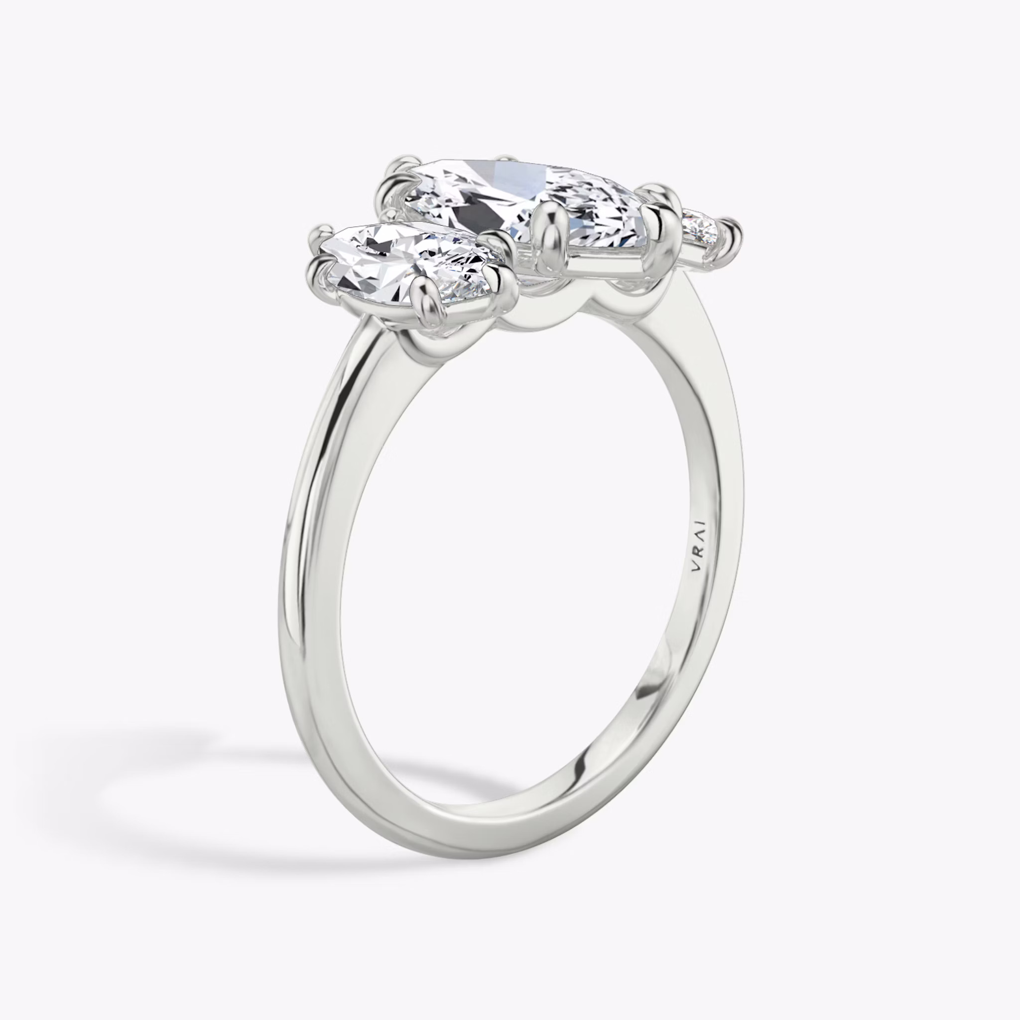 The Three Stone | Marquise | Platinum | bandAccent: Plain | sideStoneCarat: 0.50ct | sideStoneShape: Marquise | diamondOrientation: vertical | caratWeight: other