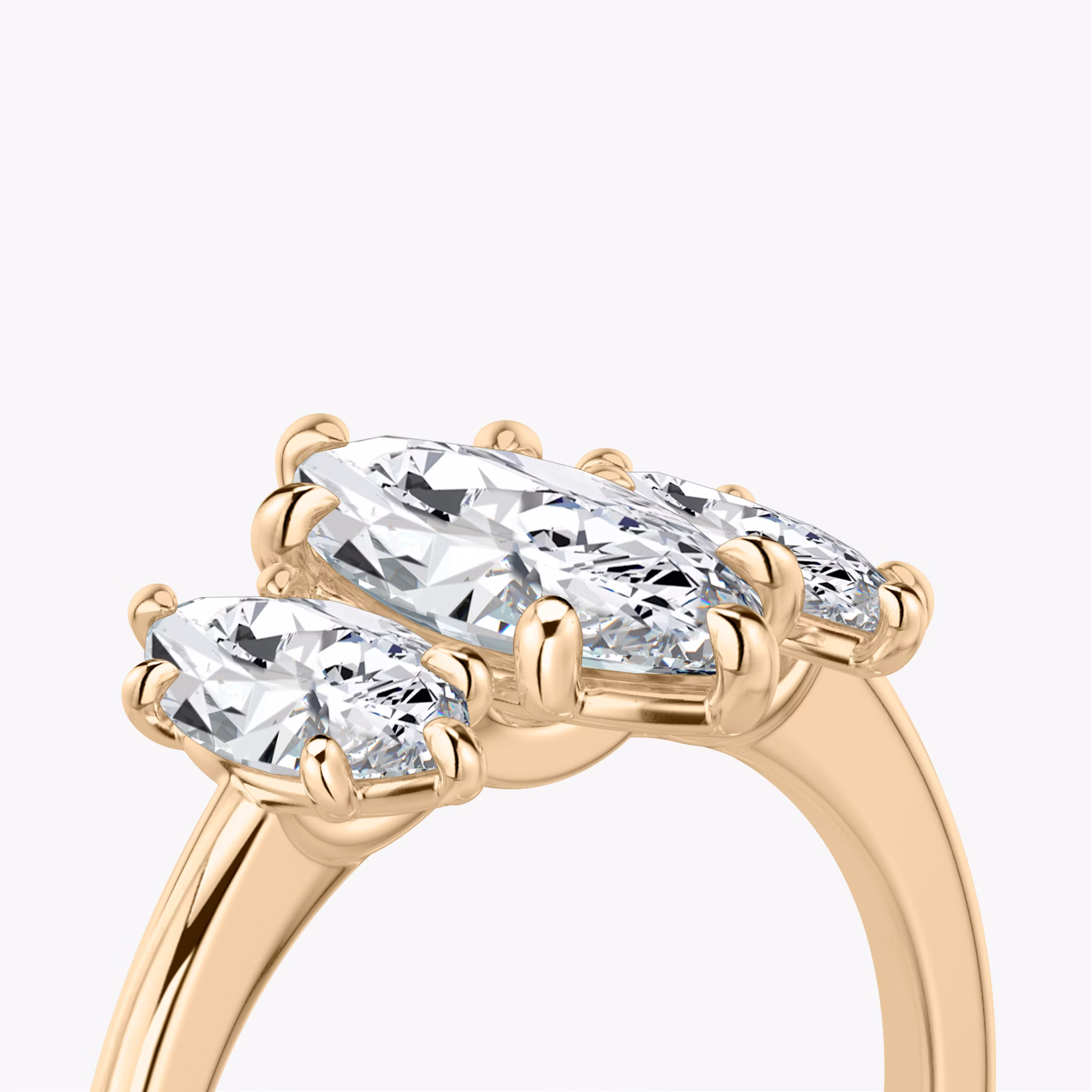The Three Stone | Marquise | 14k | Rose Gold | bandAccent: Plain | sideStoneCarat: 0.50ct | sideStoneShape: Marquise | diamondOrientation: vertical | caratWeight: other