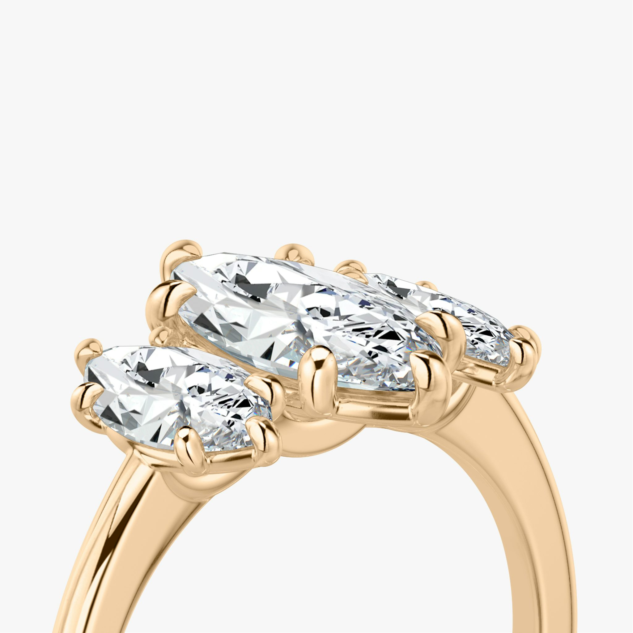 The Three Stone | Marquise | 14k | Rose Gold | bandAccent: Plain | sideStoneCarat: 0.50ct | sideStoneShape: Marquise | diamondOrientation: vertical | caratWeight: other