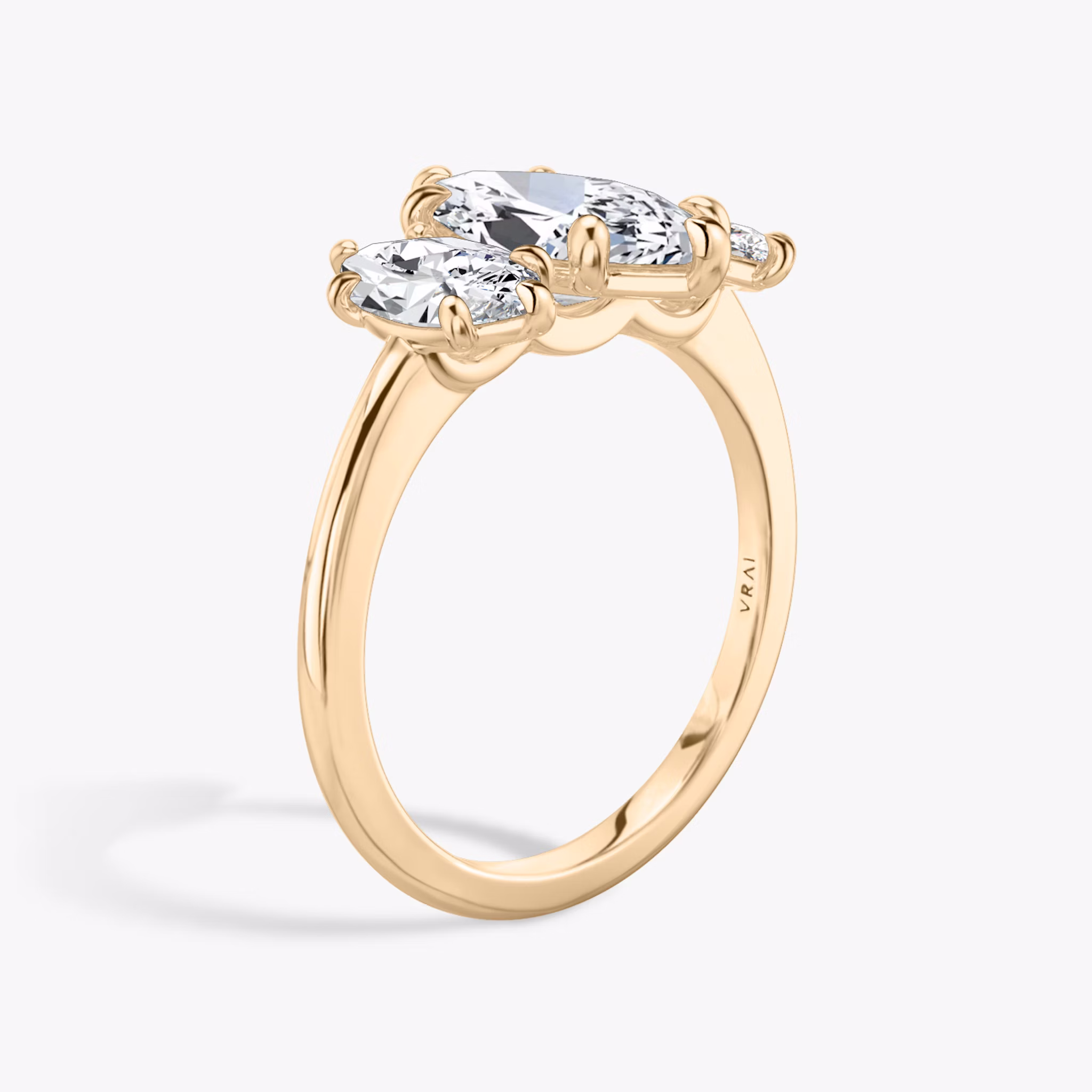 The Three Stone | Marquise | 14k | Rose Gold | bandAccent: Plain | sideStoneCarat: 0.50ct | sideStoneShape: Marquise | diamondOrientation: vertical | caratWeight: other
