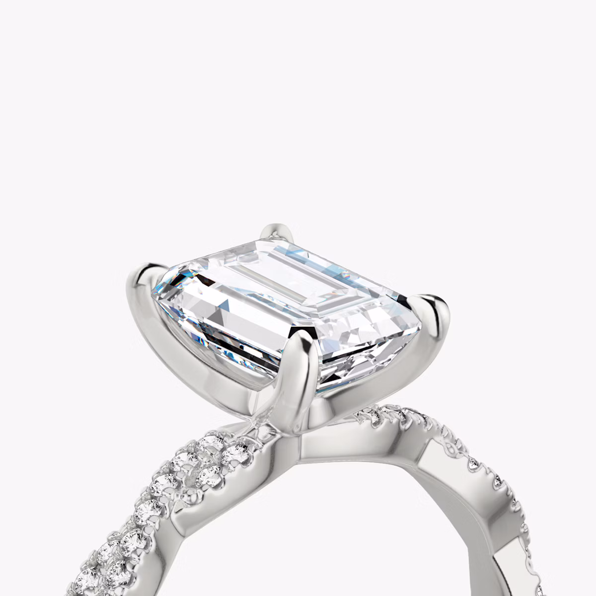 The Twisted Classic | Emerald | 18k | White Gold | bandAccent: Double pavé | diamondOrientation: vertical | caratWeight: other