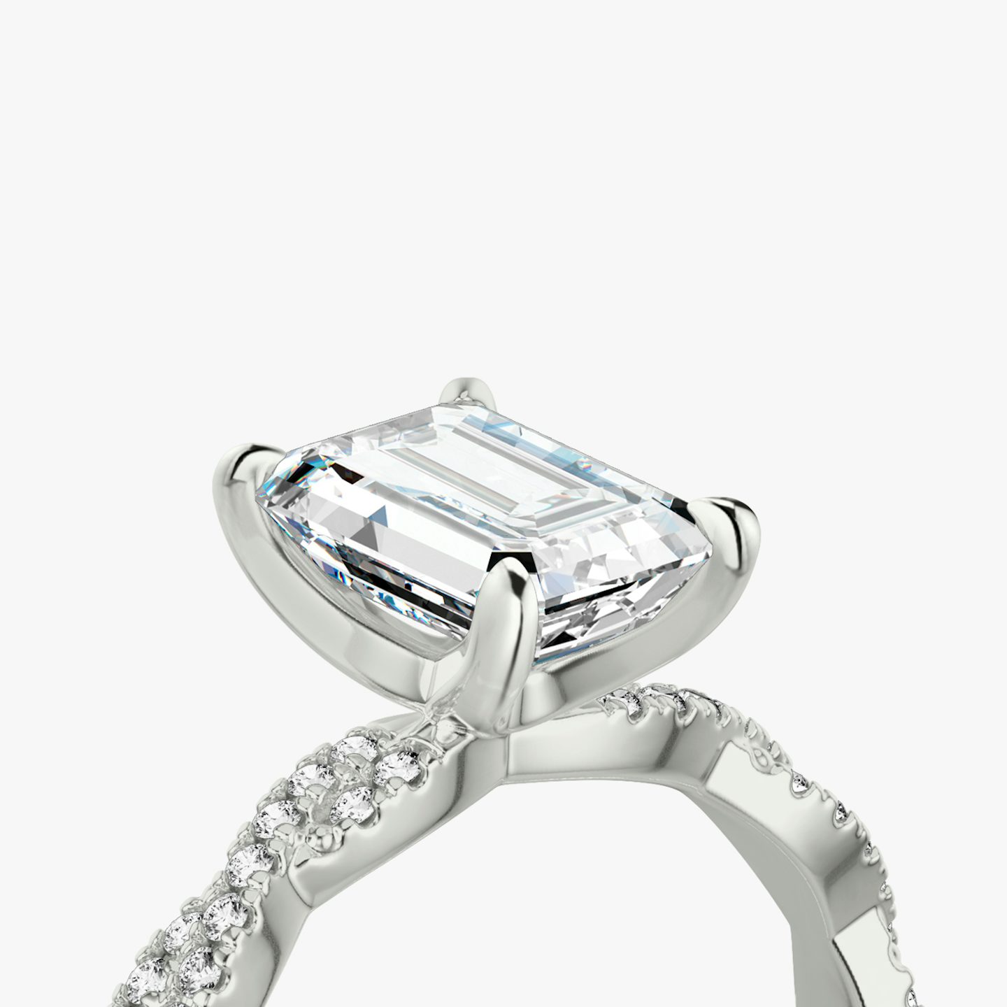 The Twisted Classic | Emerald | Platinum | bandAccent: Double pavé | diamondOrientation: vertical | caratWeight: other