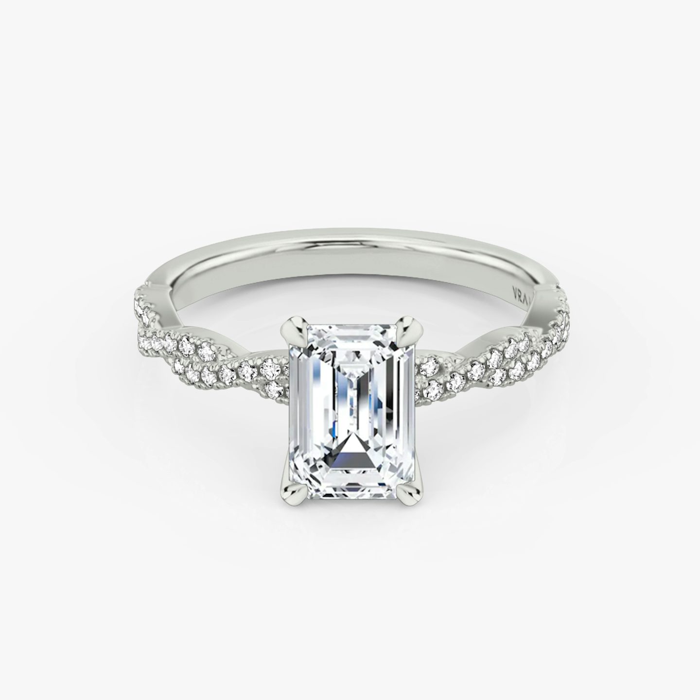 The Twisted Classic | Emerald | Platinum | bandAccent: Double pavé | diamondOrientation: vertical | caratWeight: other