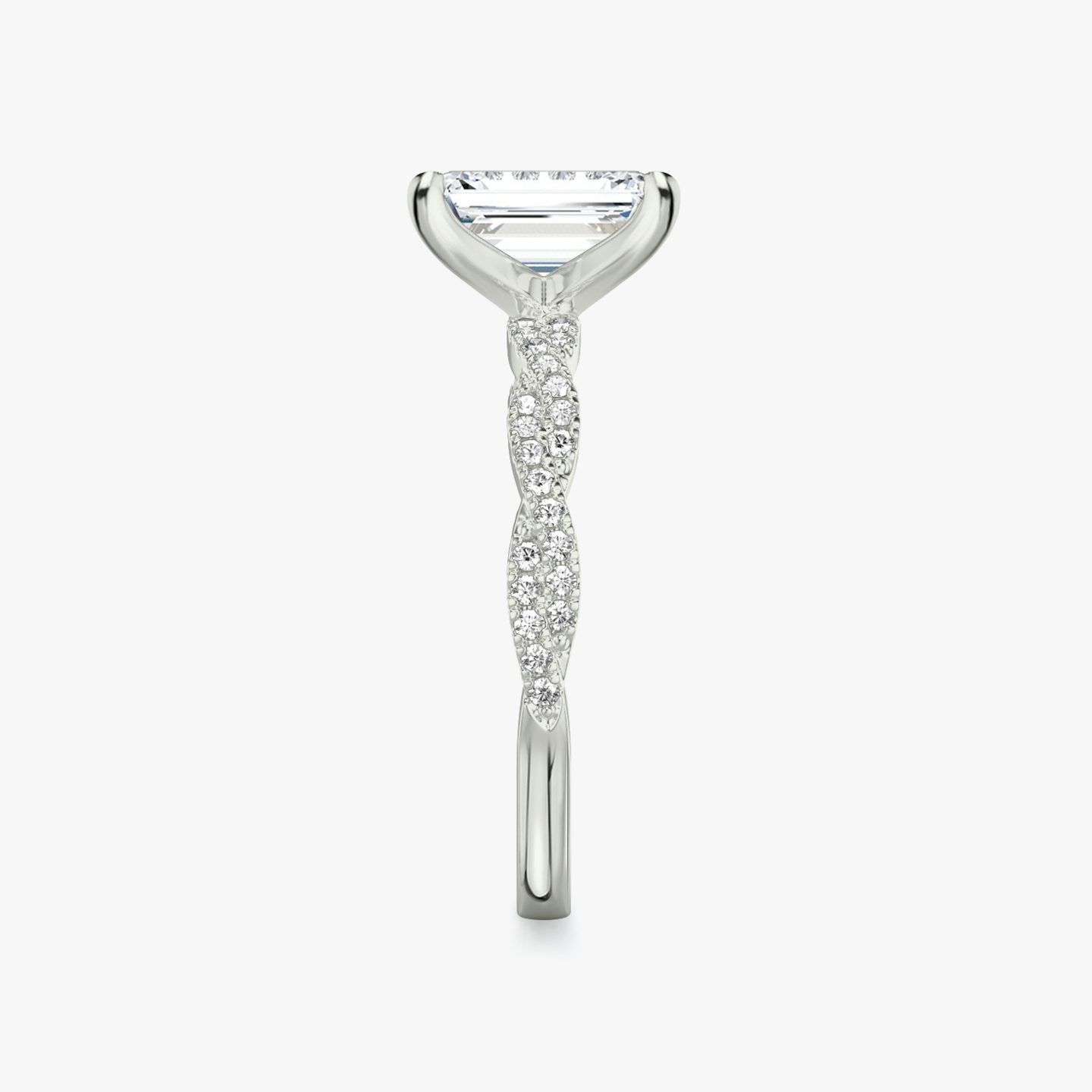 The Twisted Classic | Emerald | Platinum | bandAccent: Double pavé | diamondOrientation: vertical | caratWeight: other