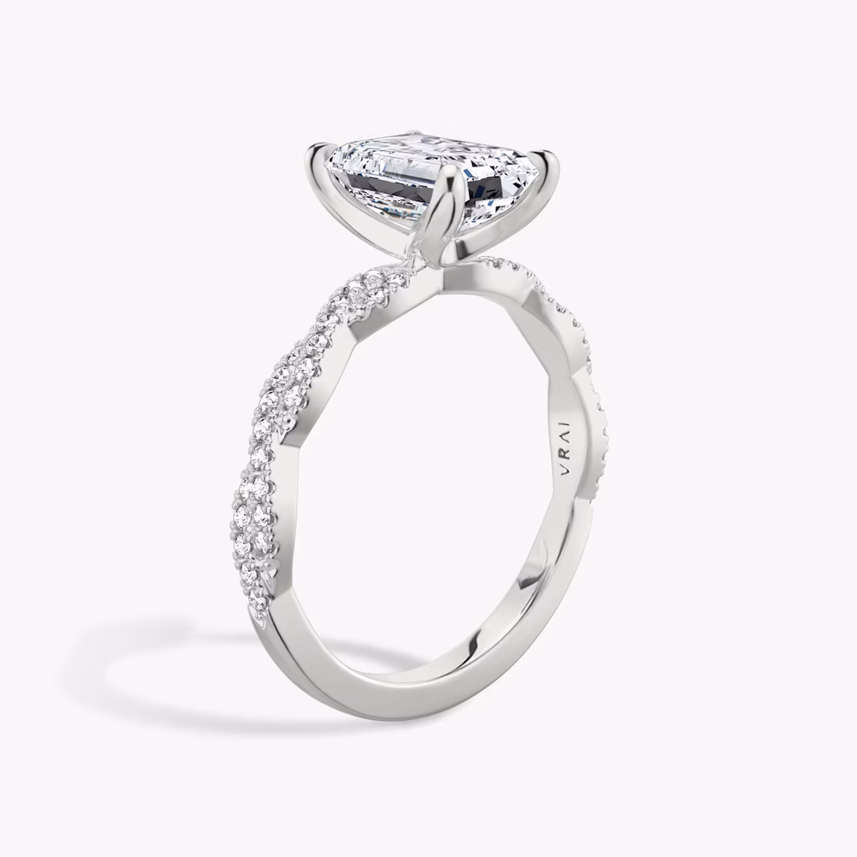 The Twisted Classic | Emerald | 18k | White Gold | bandAccent: Double pavé | diamondOrientation: vertical | caratWeight: other
