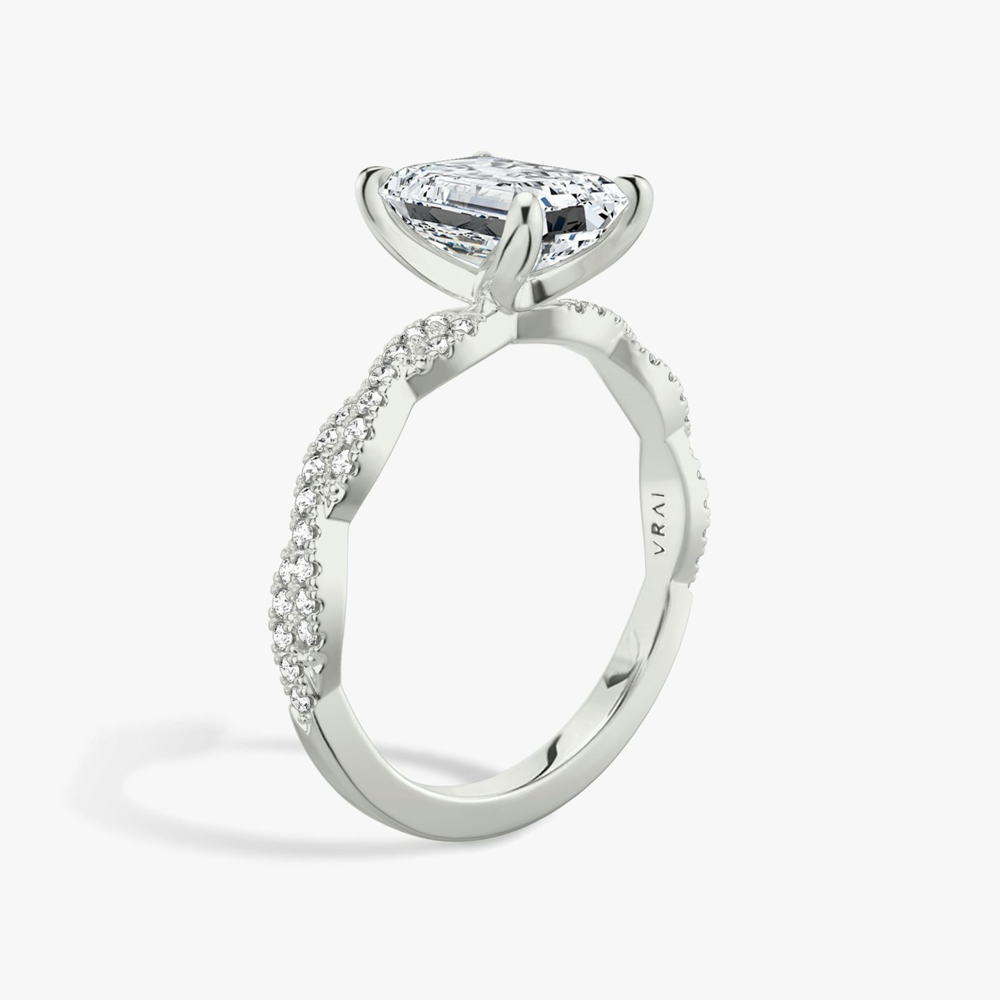 The Twisted Classic | Emerald | Platinum | bandAccent: Double pavé | diamondOrientation: vertical | caratWeight: other
