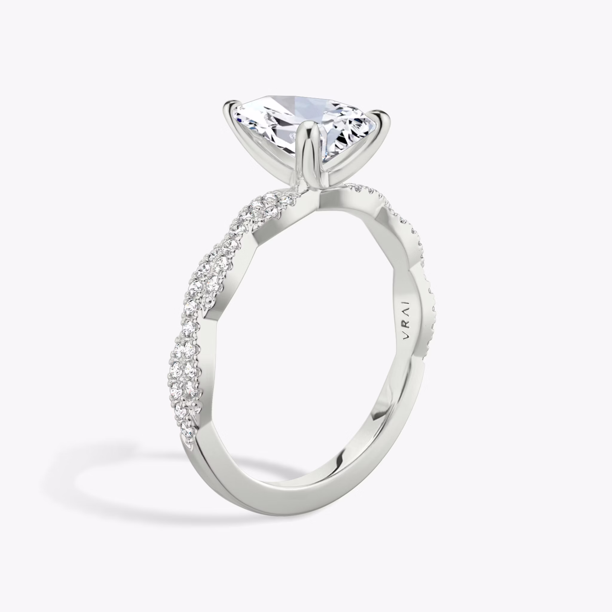 The Twisted Classic | Pear | Platinum | bandAccent: Double pavé | diamondOrientation: vertical | caratWeight: other