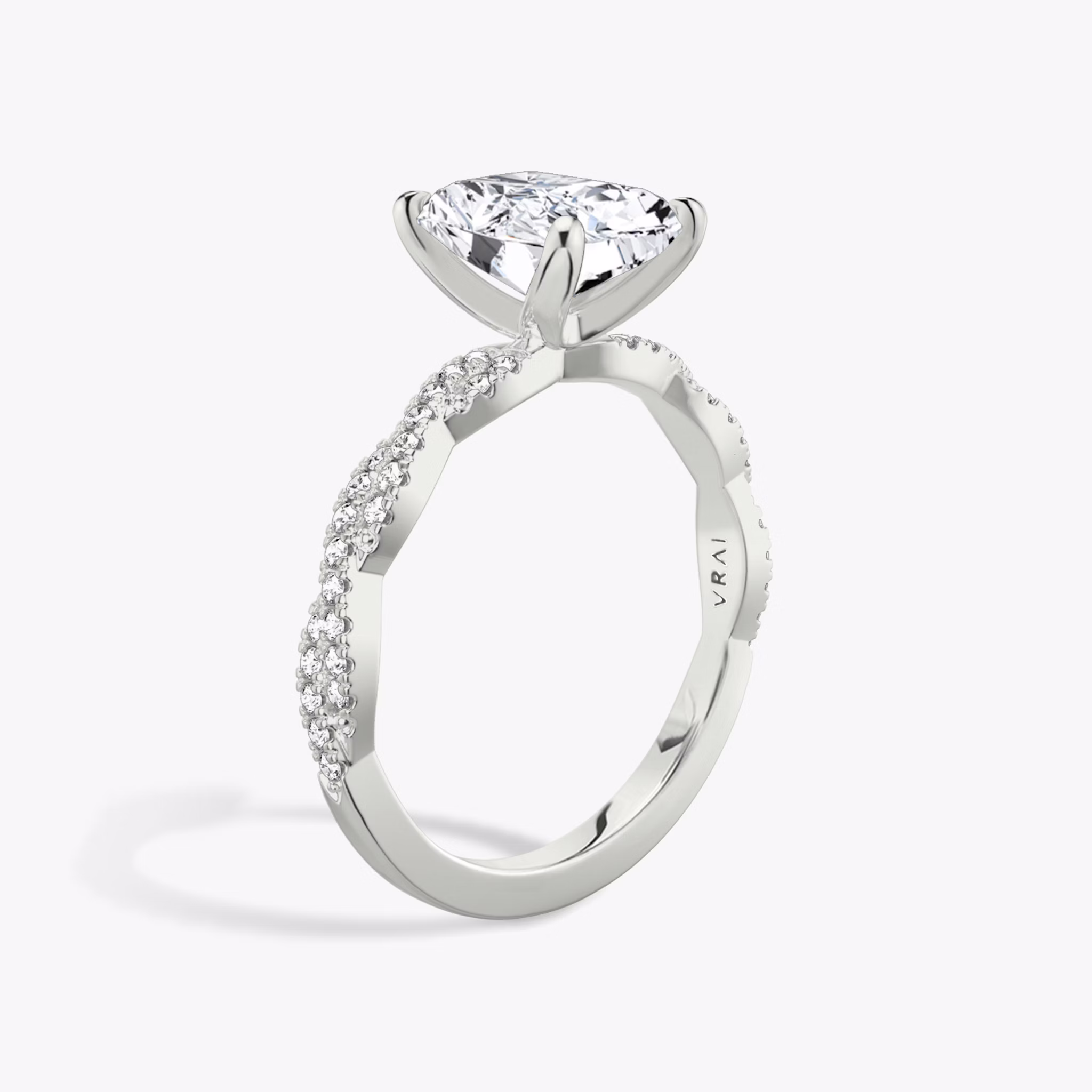 The Twisted Classic | Radiant | Platinum | bandAccent: Double pavé | diamondOrientation: vertical | caratWeight: other
