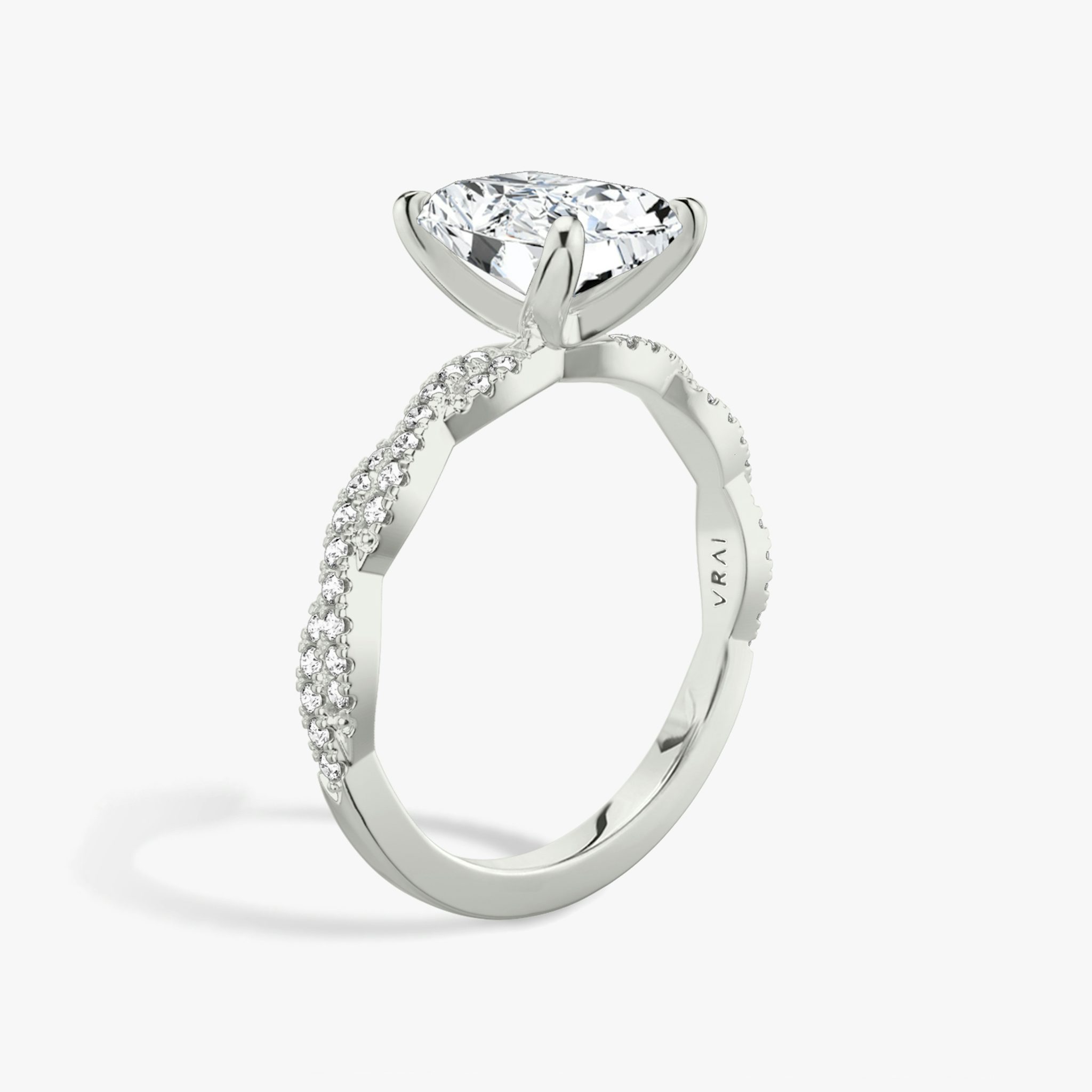 The Twisted Classic | Radiant | Platinum | bandAccent: Double pavé | diamondOrientation: vertical | caratWeight: other