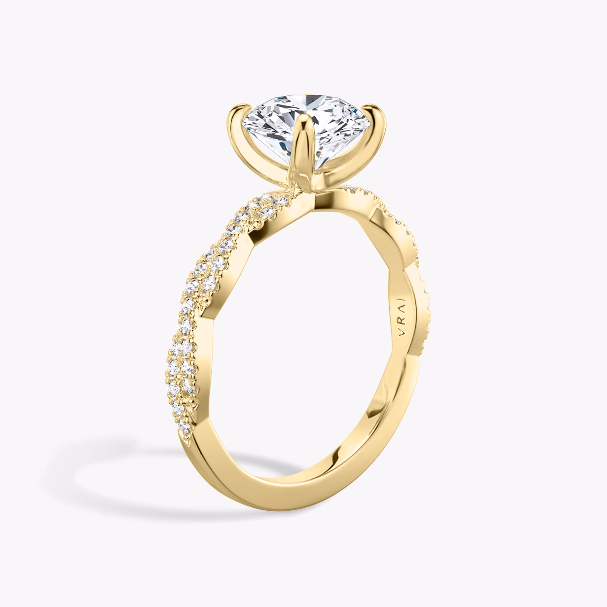 The Twisted Classic | Round Brilliant | 18k | Yellow Gold | bandAccent: Double pavé | caratWeight: other | diamondOrientation: vertical