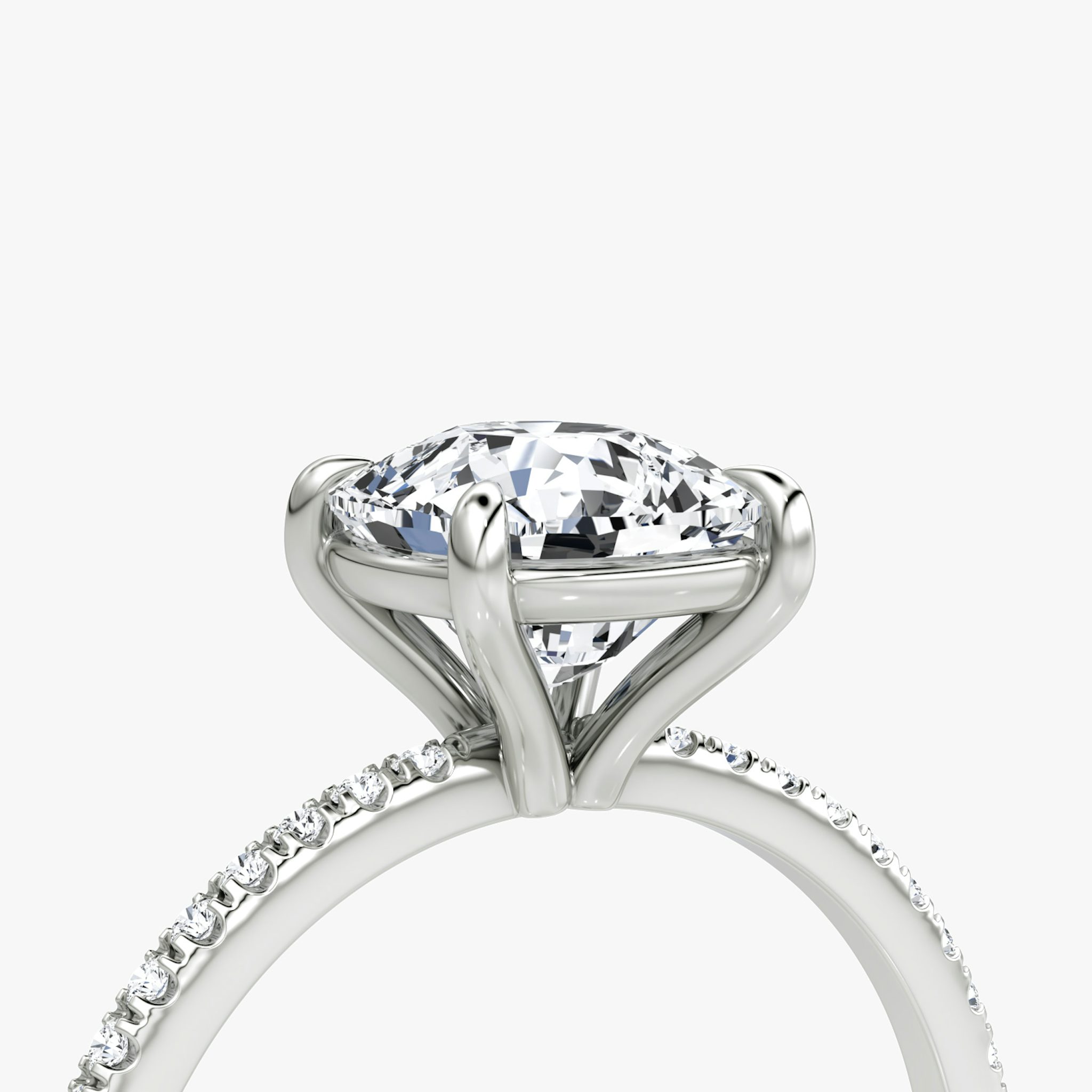 The Petite 4-Prong Solitaire | Cushion | Platinum | bandAccent: Pavé | diamondOrientation: vertical | caratWeight: other