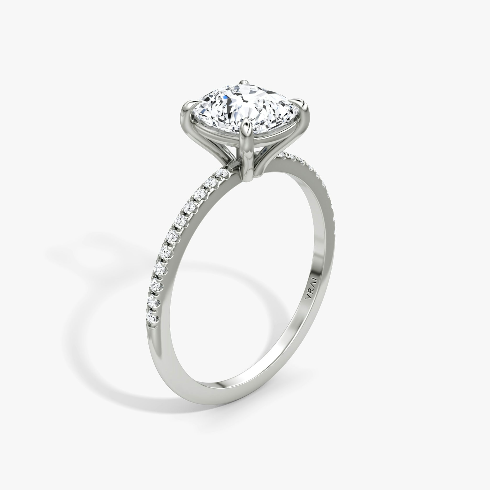 The Petite 4-Prong Solitaire | Cushion | Platinum | bandAccent: Pavé | diamondOrientation: vertical | caratWeight: other