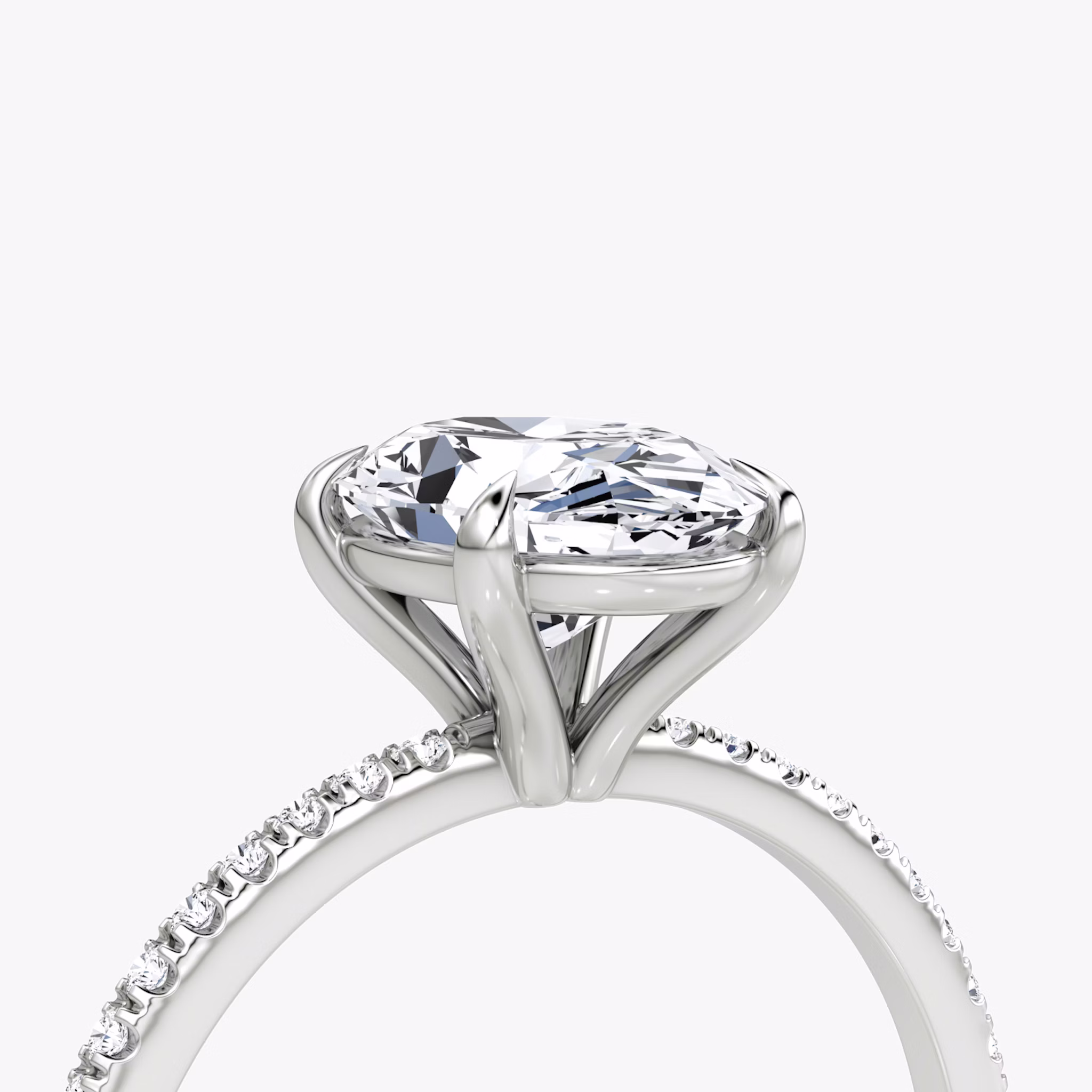 The Petite 4-Prong Solitaire | Oval | Platinum | bandAccent: Pavé | diamondOrientation: vertical | caratWeight: other