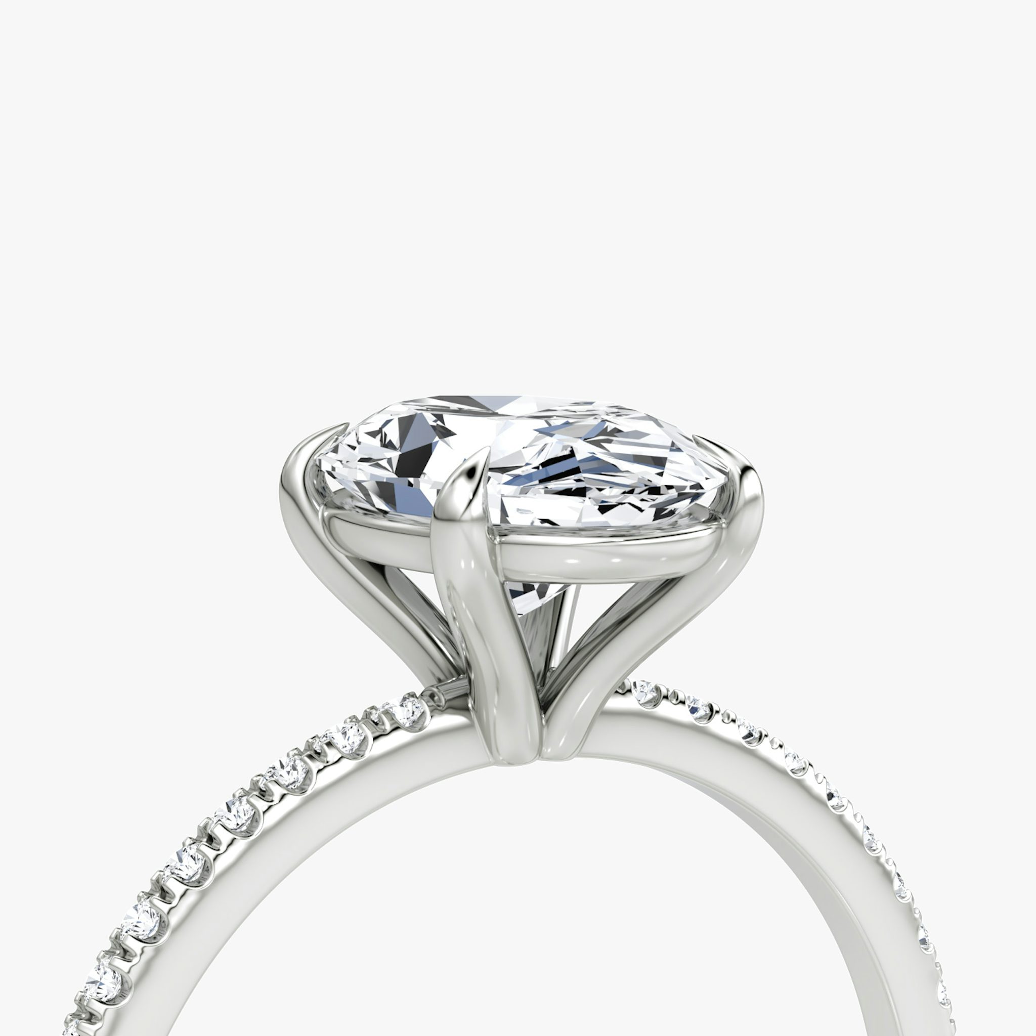 The Petite 4-Prong Solitaire | Oval | Platinum | bandAccent: Pavé | diamondOrientation: vertical | caratWeight: other