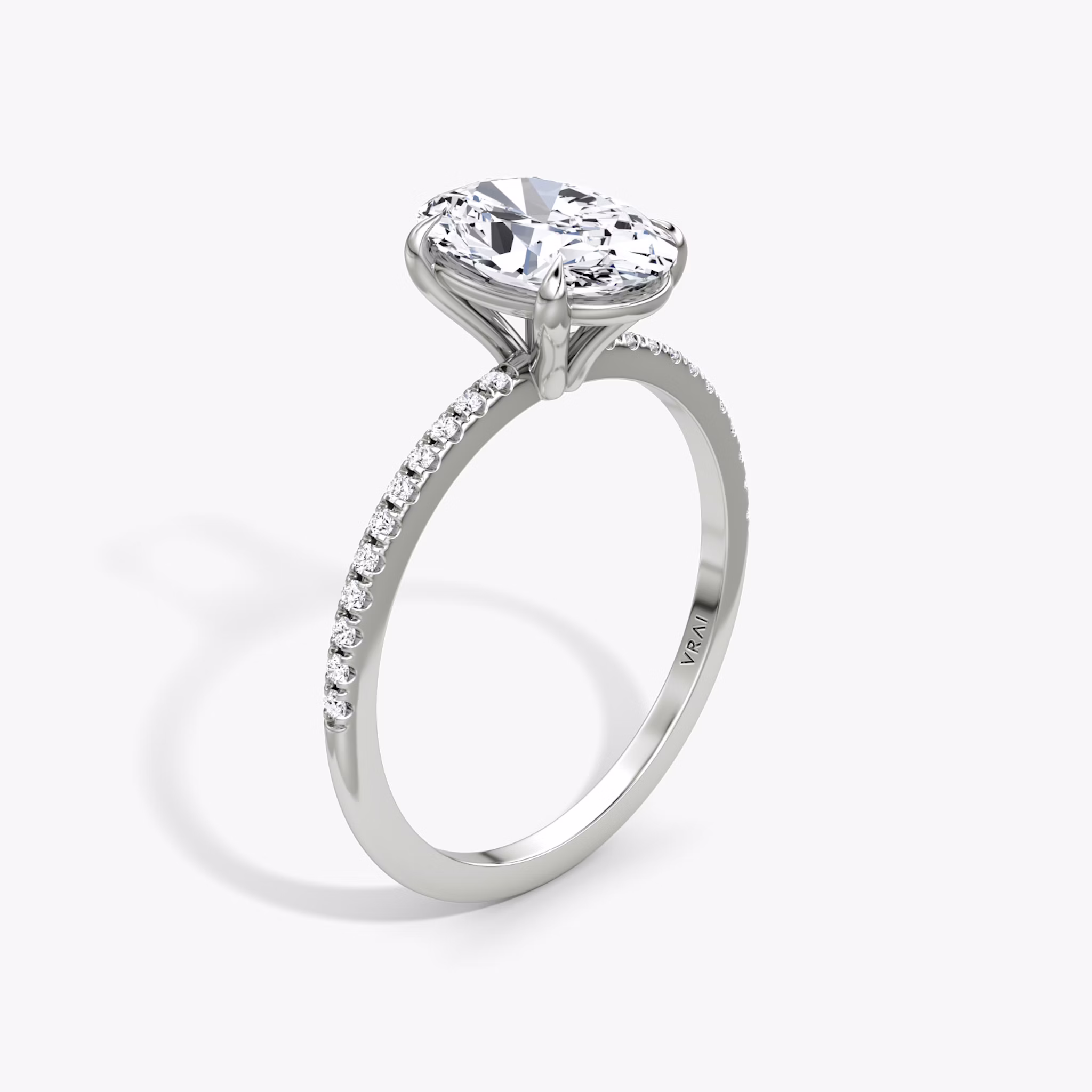 The Petite 4-Prong Solitaire | Oval | Platinum | bandAccent: Pavé | diamondOrientation: vertical | caratWeight: other