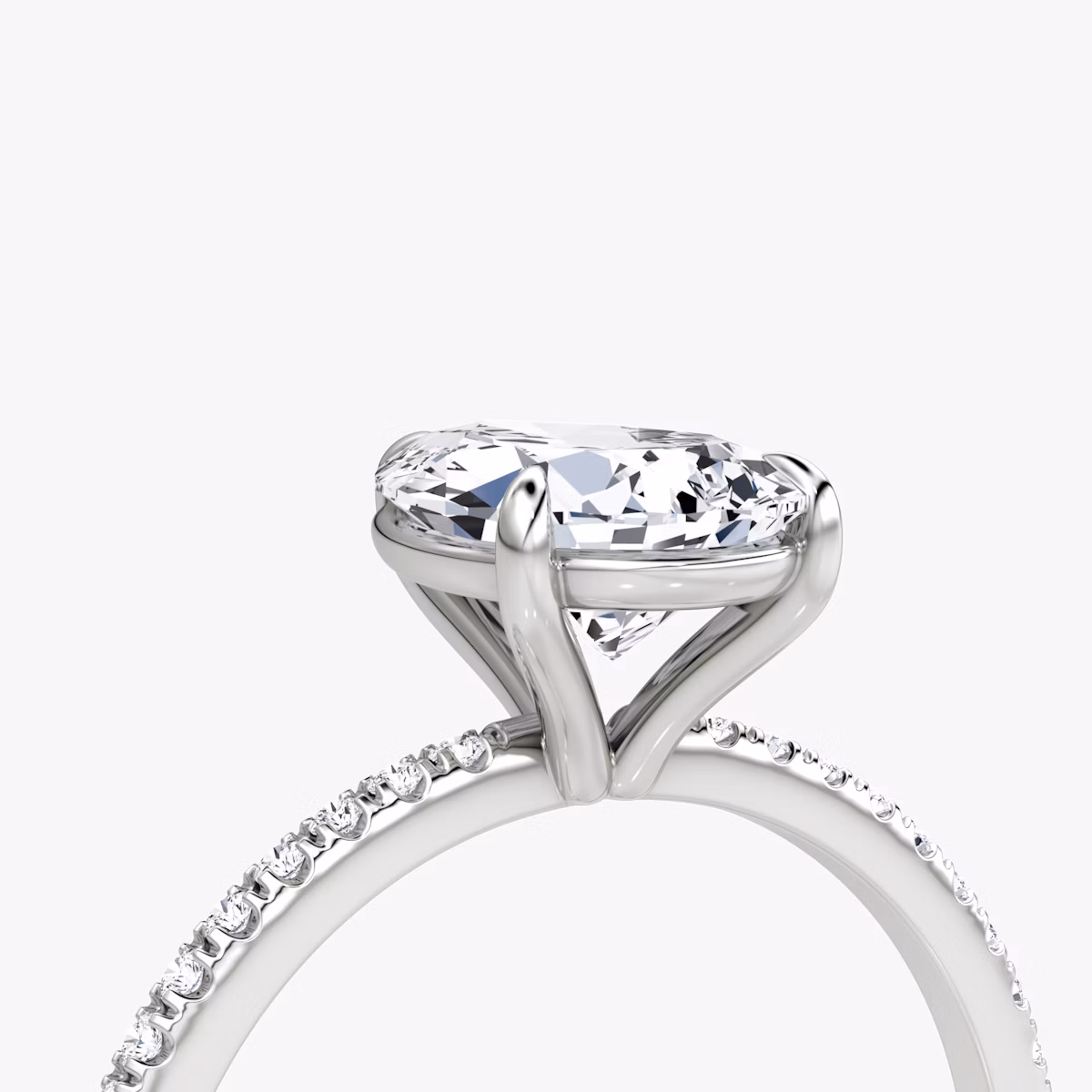 The Petite 4-Prong Solitaire | Pear | 18k | White Gold | bandAccent: Pavé | diamondOrientation: vertical | caratWeight: other